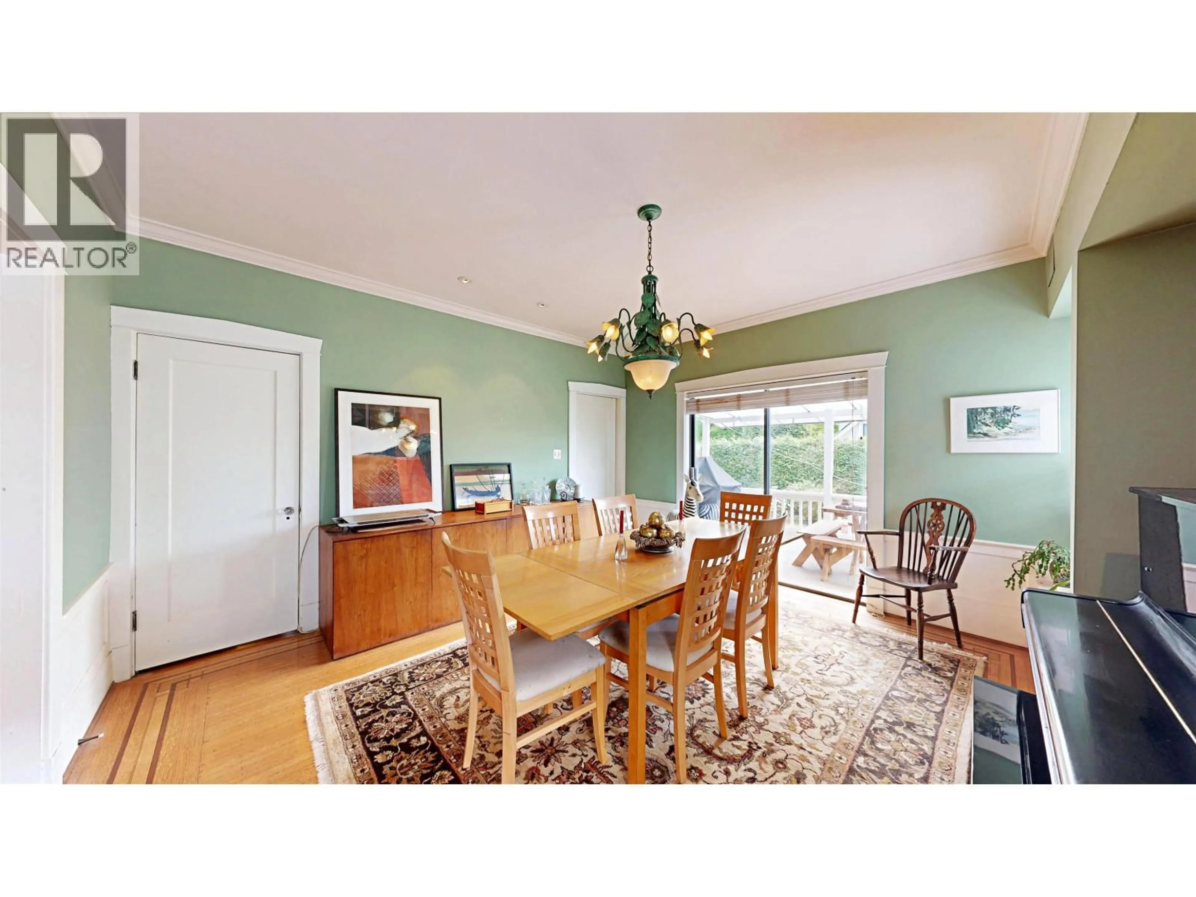 Dining room, wood/laminate floor for 4402 12TH AVENUE, Vancouver British Columbia V6R2R2