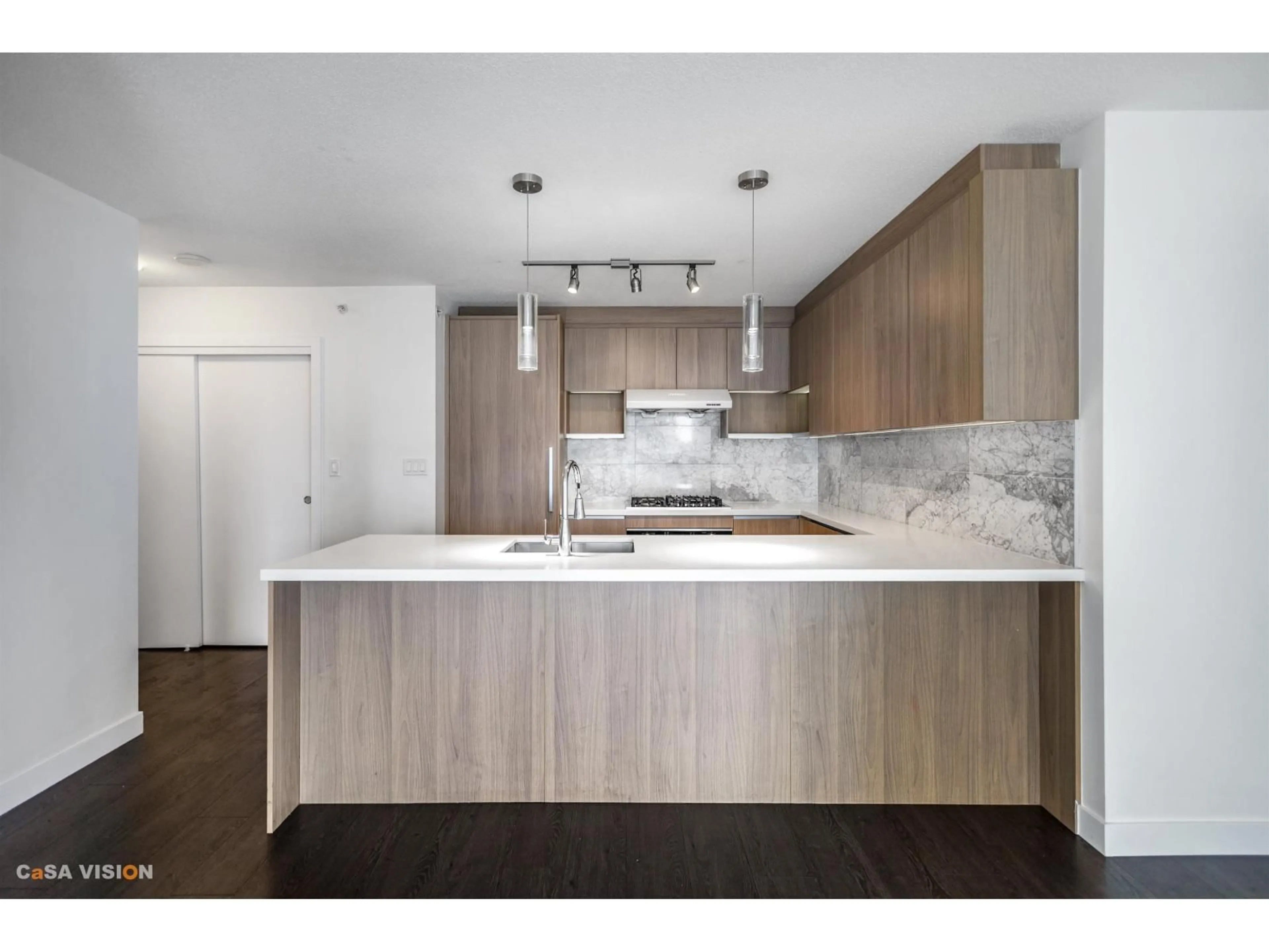 Open concept kitchen, wood/laminate floor for 1606 - 13750 100 AVENUE, Surrey British Columbia V3T0L3