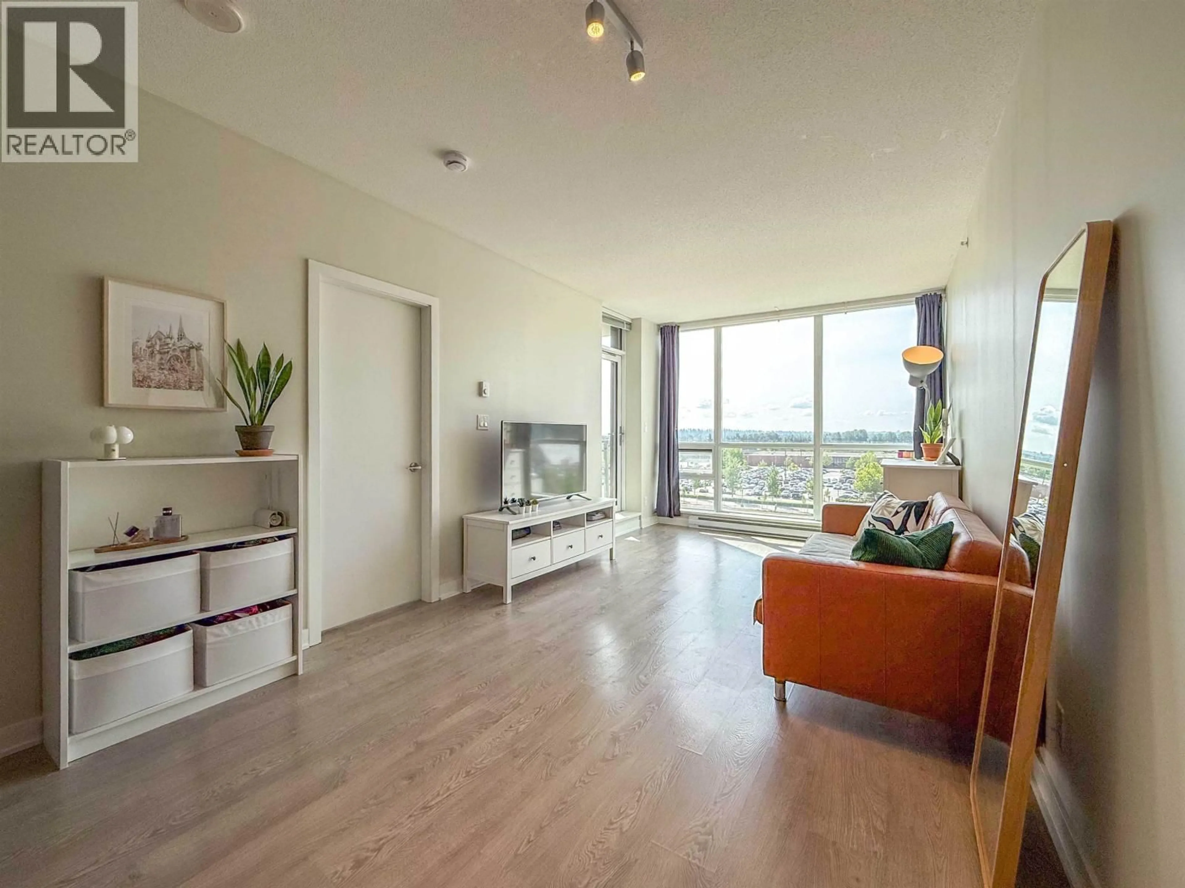 Living room with furniture, wood/laminate floor for 705 - 2975 ATLANTIC AVENUE, Coquitlam British Columbia V3B0C5