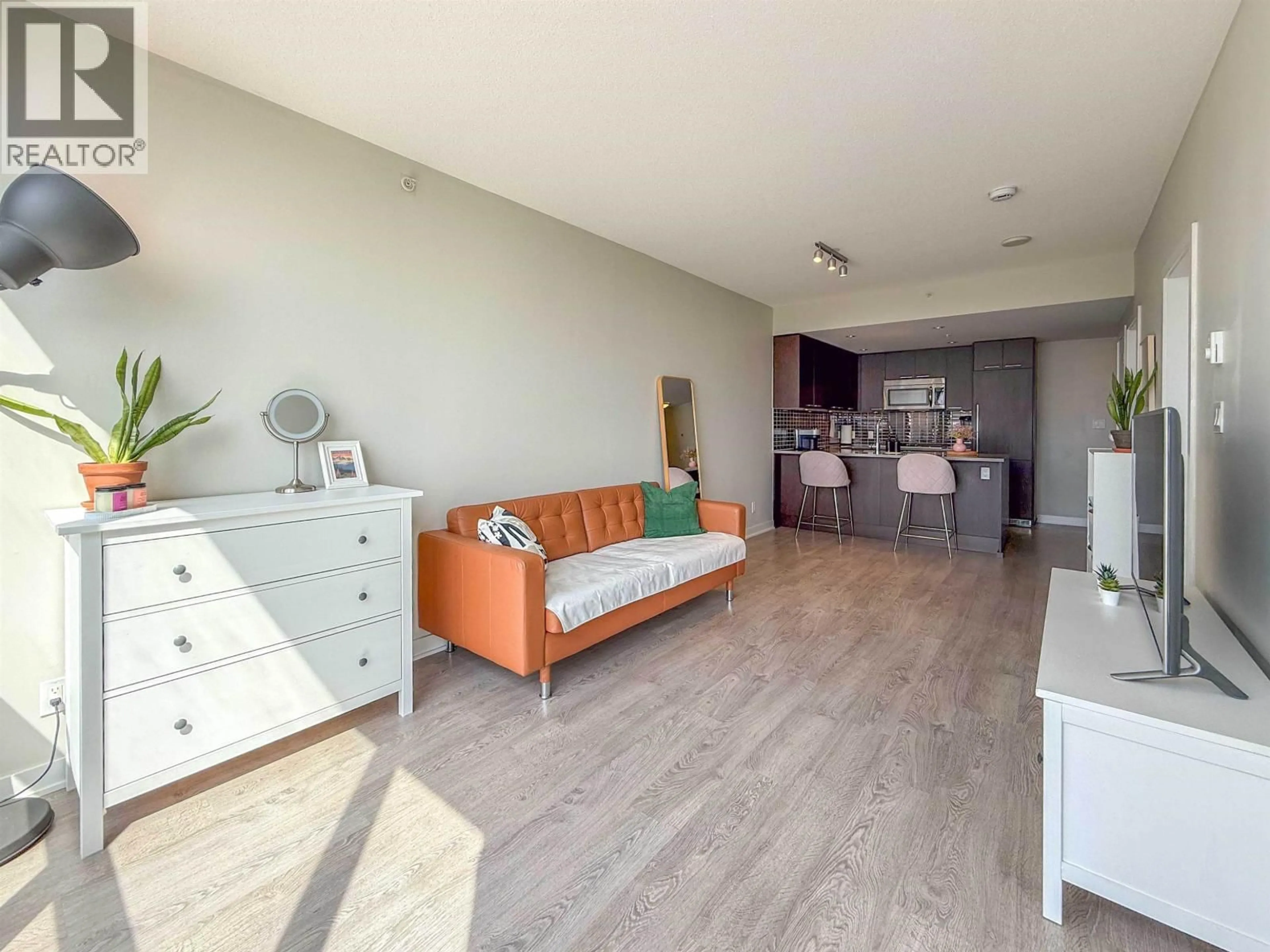 Living room with furniture, wood/laminate floor for 705 - 2975 ATLANTIC AVENUE, Coquitlam British Columbia V3B0C5