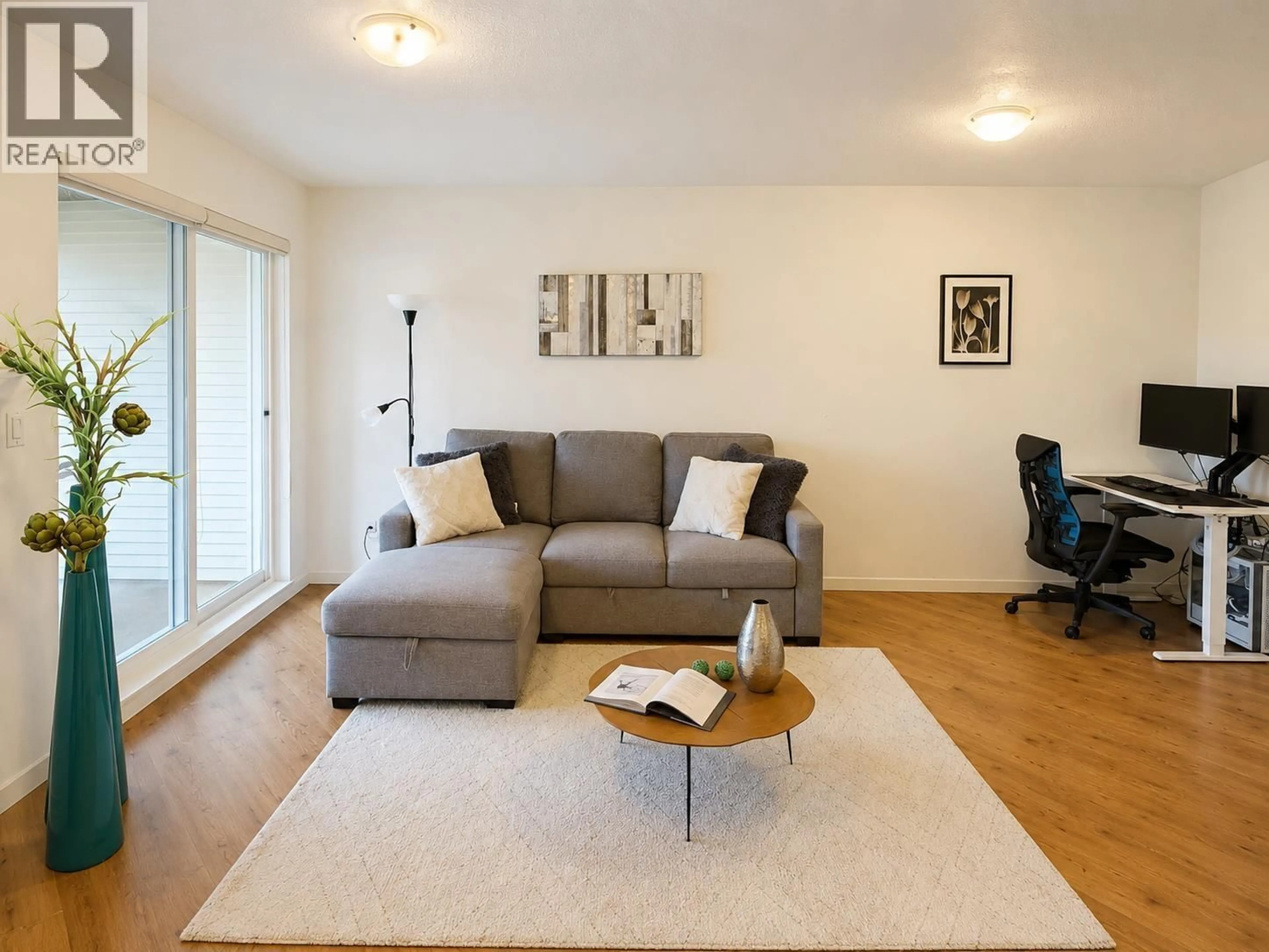 Living room with furniture, wood/laminate floor for 323 - 5600 ANDREWS ROAD, Richmond British Columbia V7E6N1