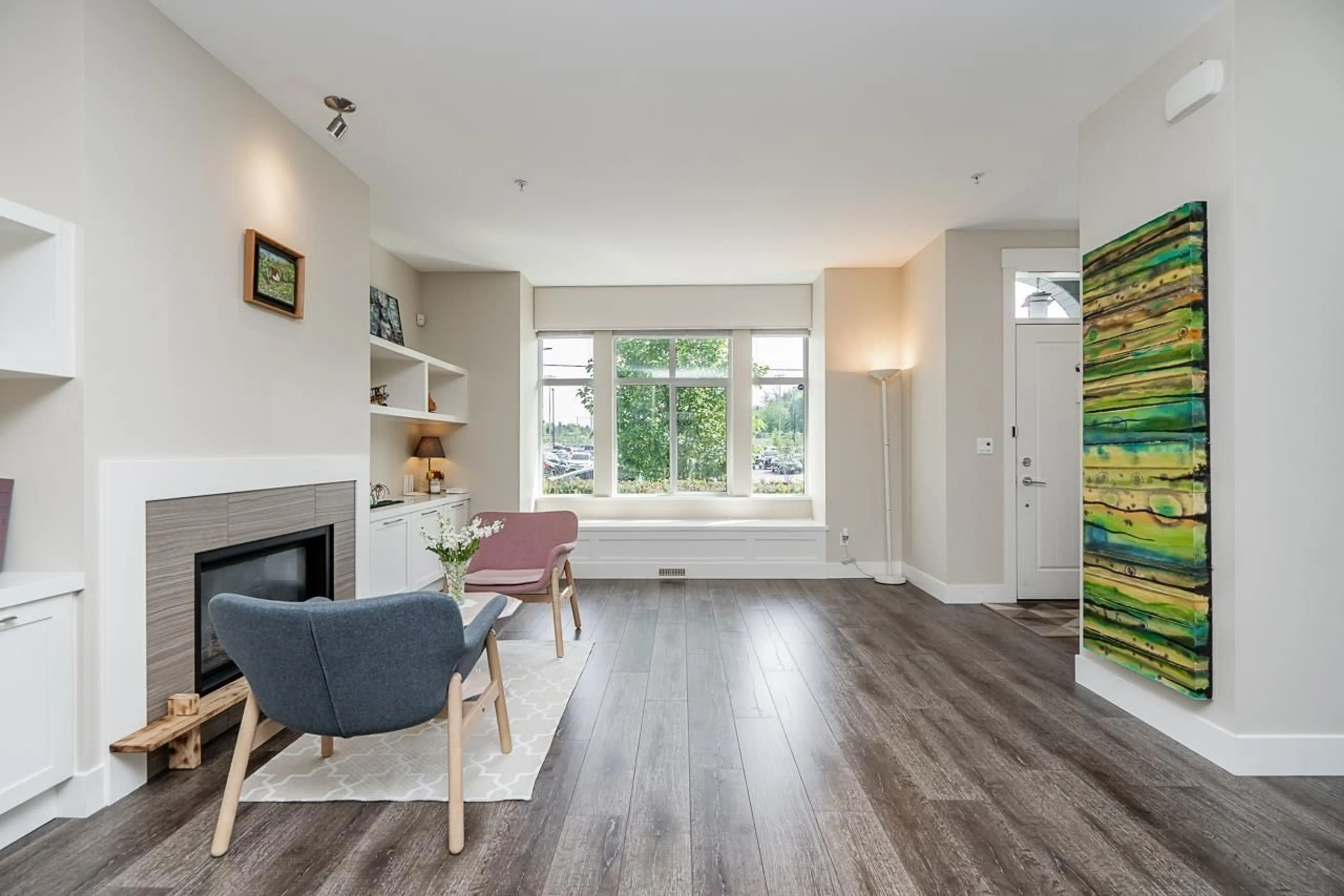 Living room with furniture, wood/laminate floor for 20591 84TH AVENUE, Langley British Columbia V2Y0P4