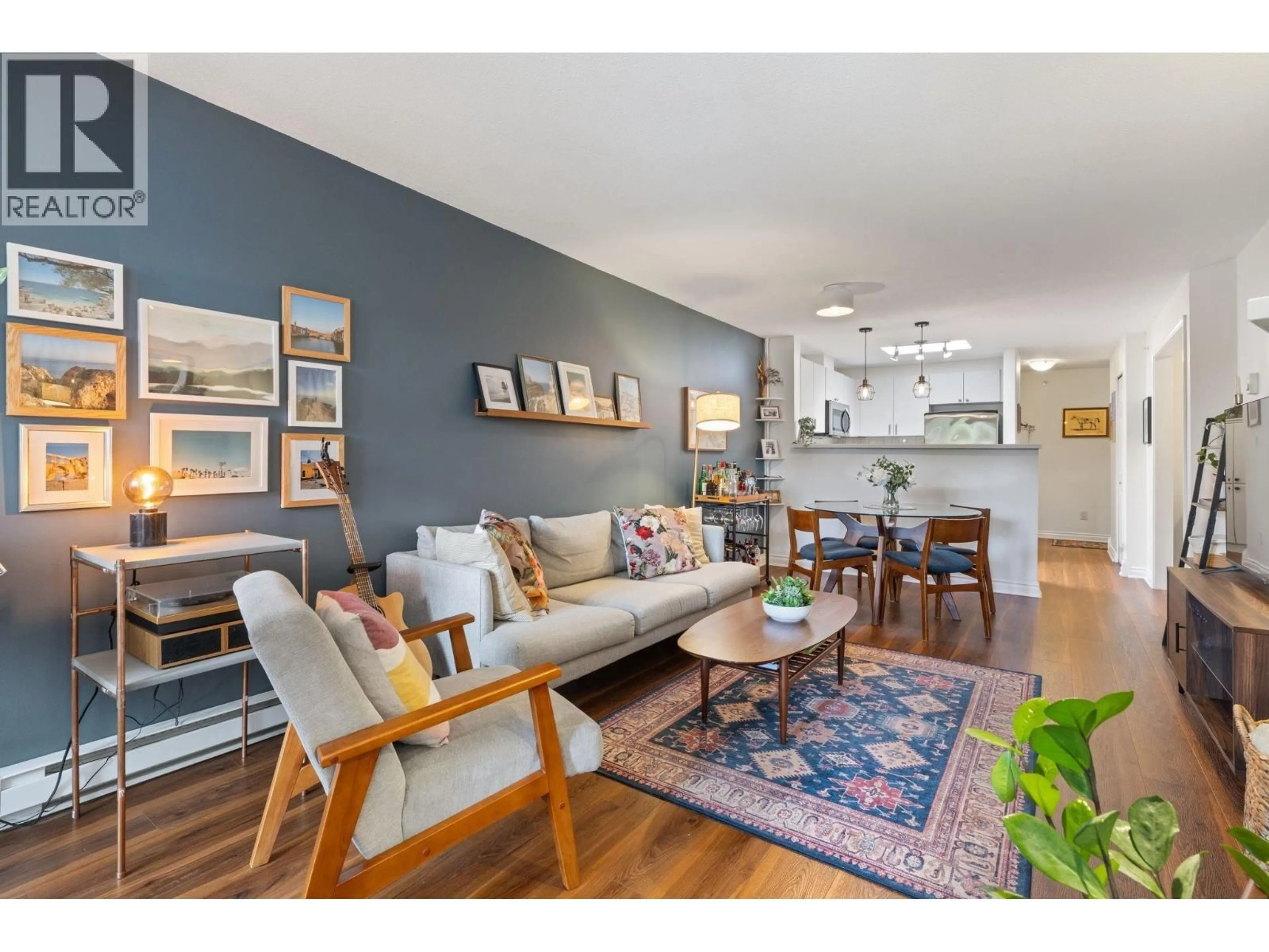 Living room with furniture, wood/laminate floor for 404 - 2741 HASTINGS STREET, Vancouver British Columbia V5K1Z8