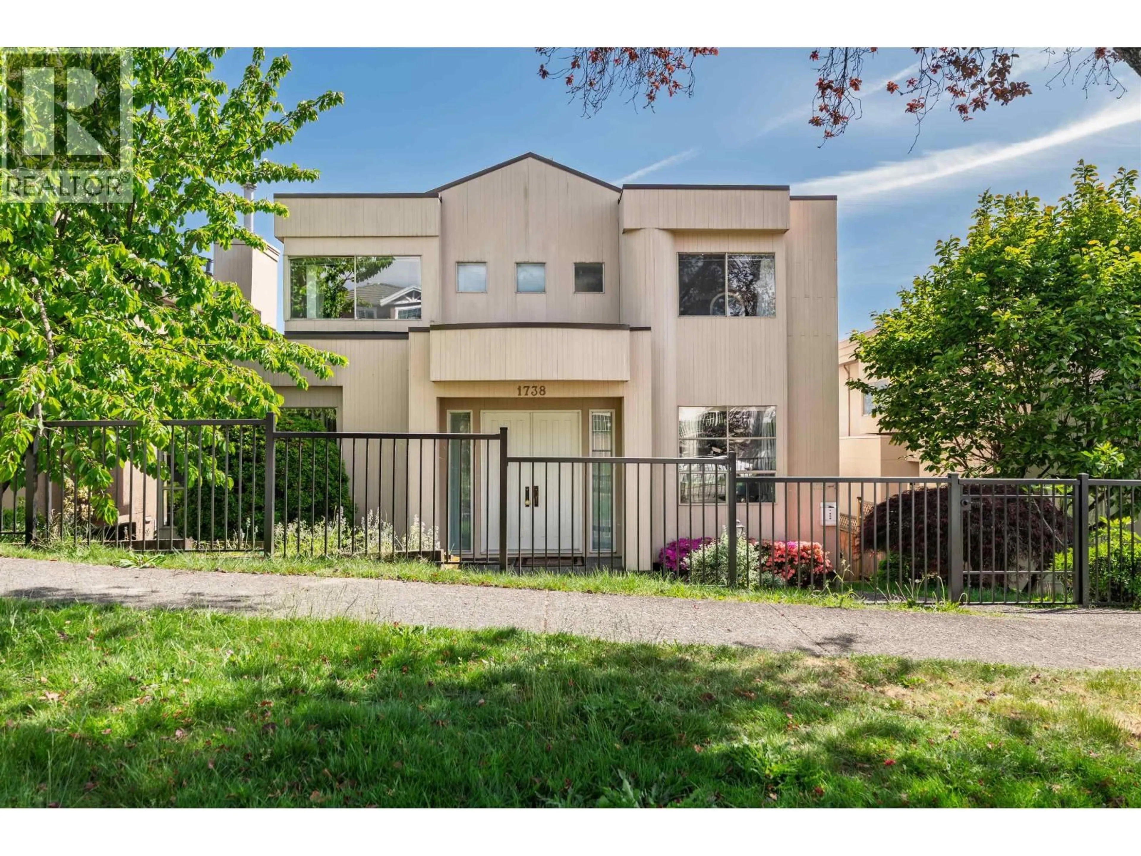 Home with vinyl exterior material, street for 1738 63RD AVENUE, Vancouver British Columbia V5P2L8