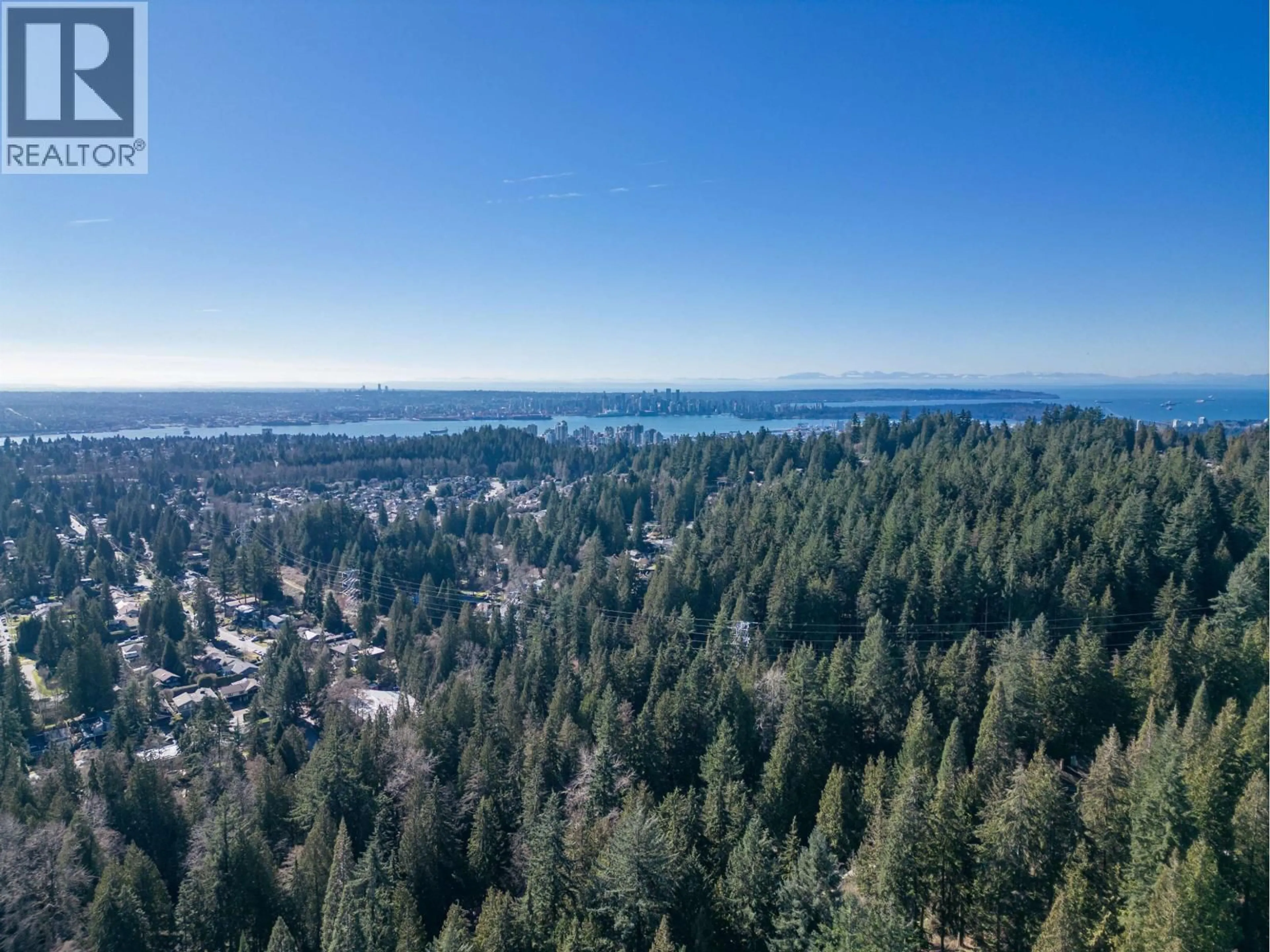 A pic from outside/outdoor area/front of a property/back of a property/a pic from drone, forest/trees view for 3866 MICHENER WAY, North Vancouver British Columbia V7K3C7
