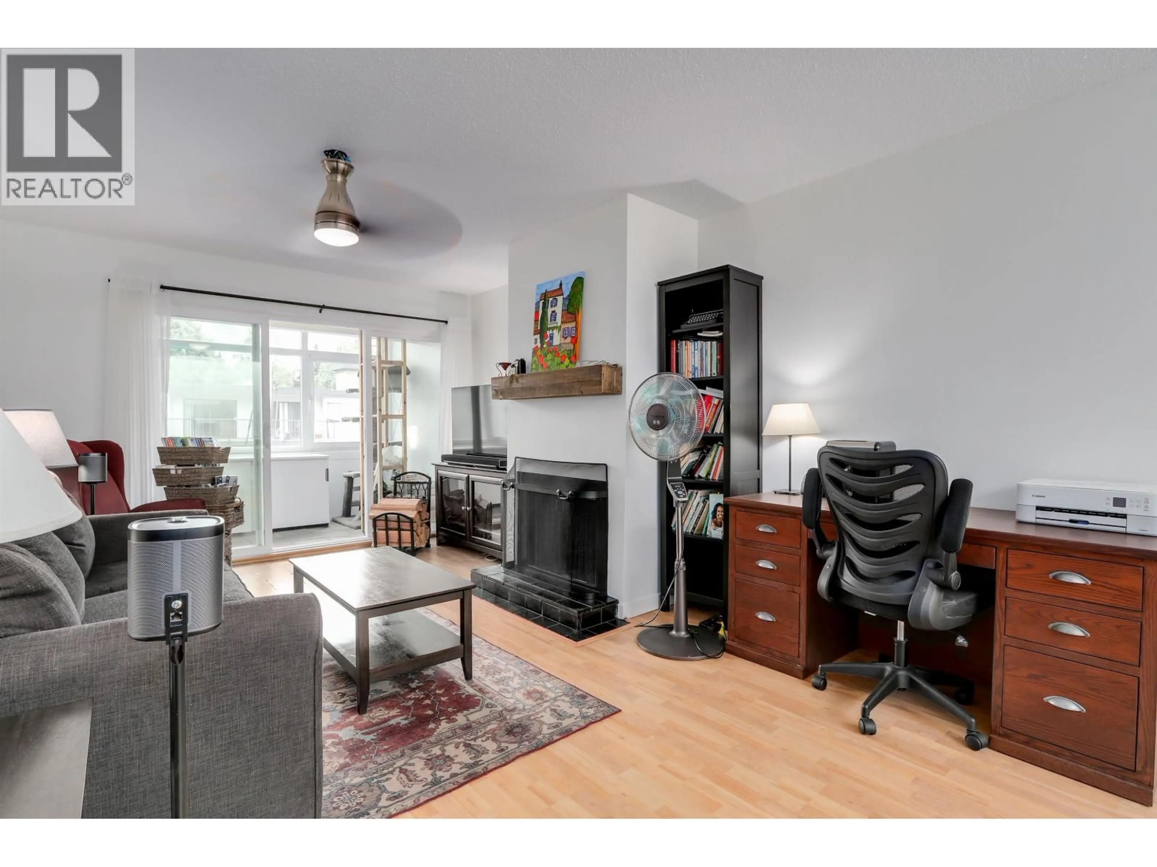 Living room with furniture, wood/laminate floor for 311 - 1420 8TH AVENUE, Vancouver British Columbia V5N1T4