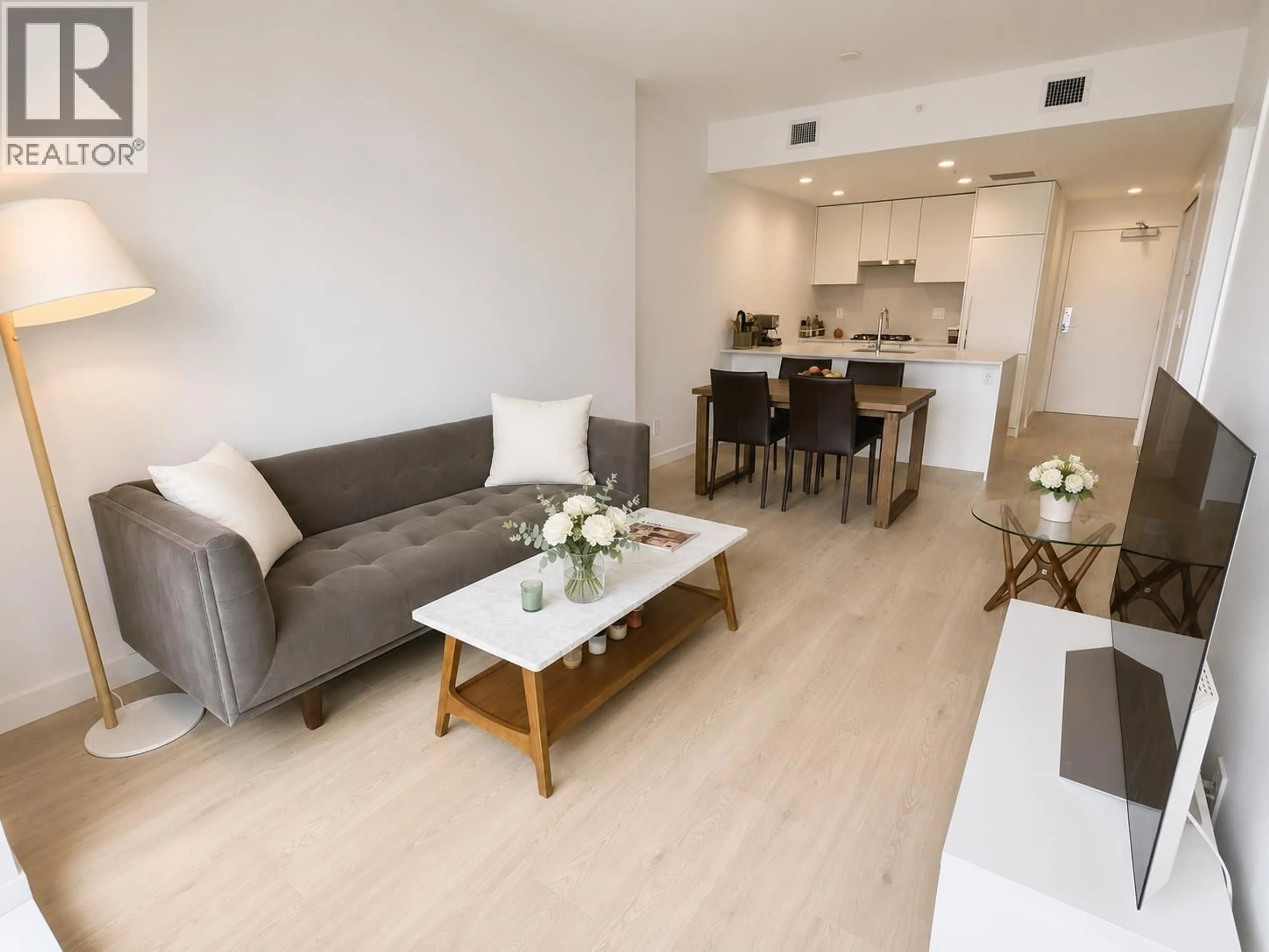Living room with furniture, wood/laminate floor for 2407 - 2181 MADISON AVENUE, Burnaby British Columbia V5C0N4