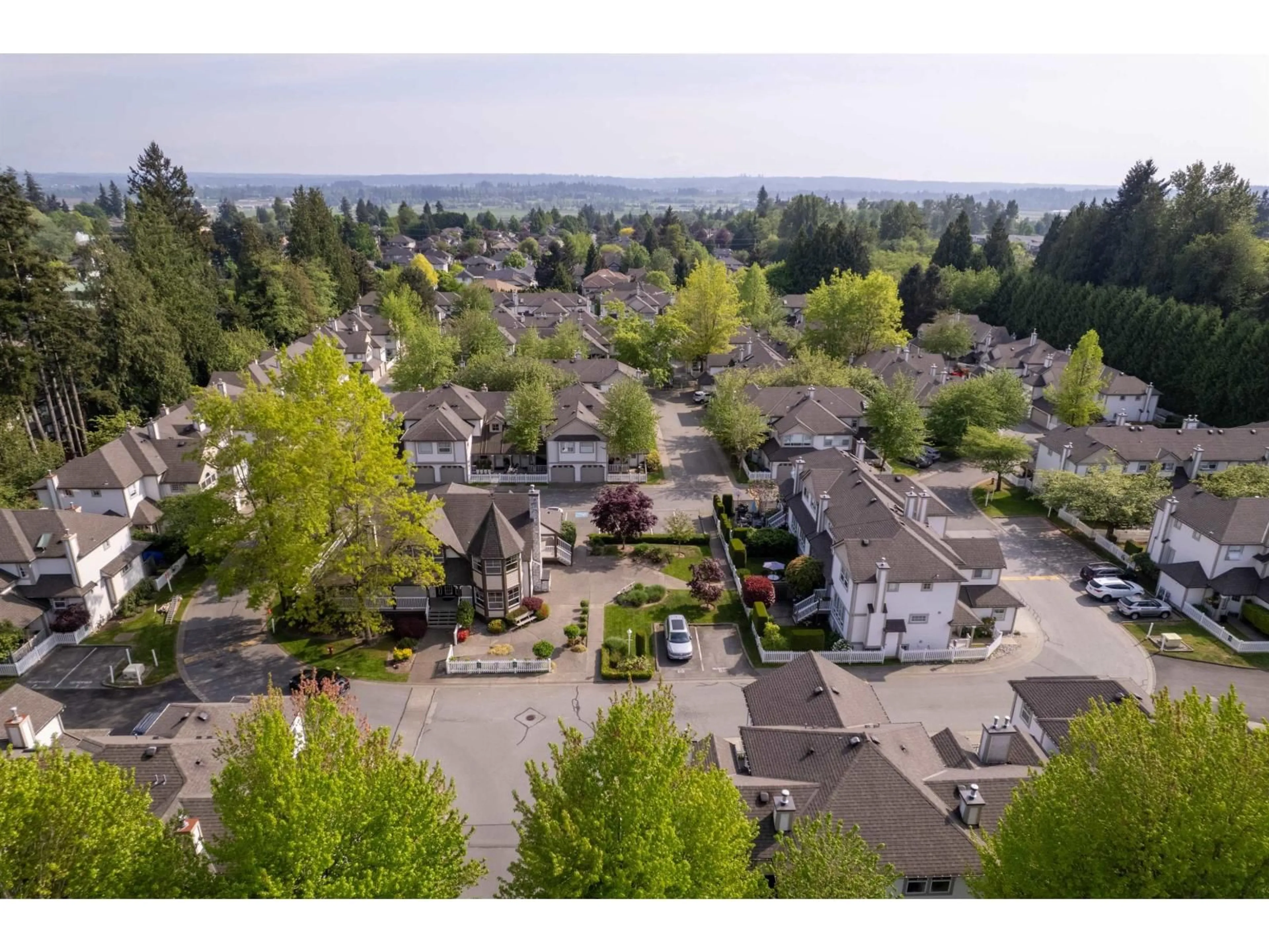 A pic from outside/outdoor area/front of a property/back of a property/a pic from drone, mountain view for 13 - 16318 82 AVENUE, Surrey British Columbia V4N0N9