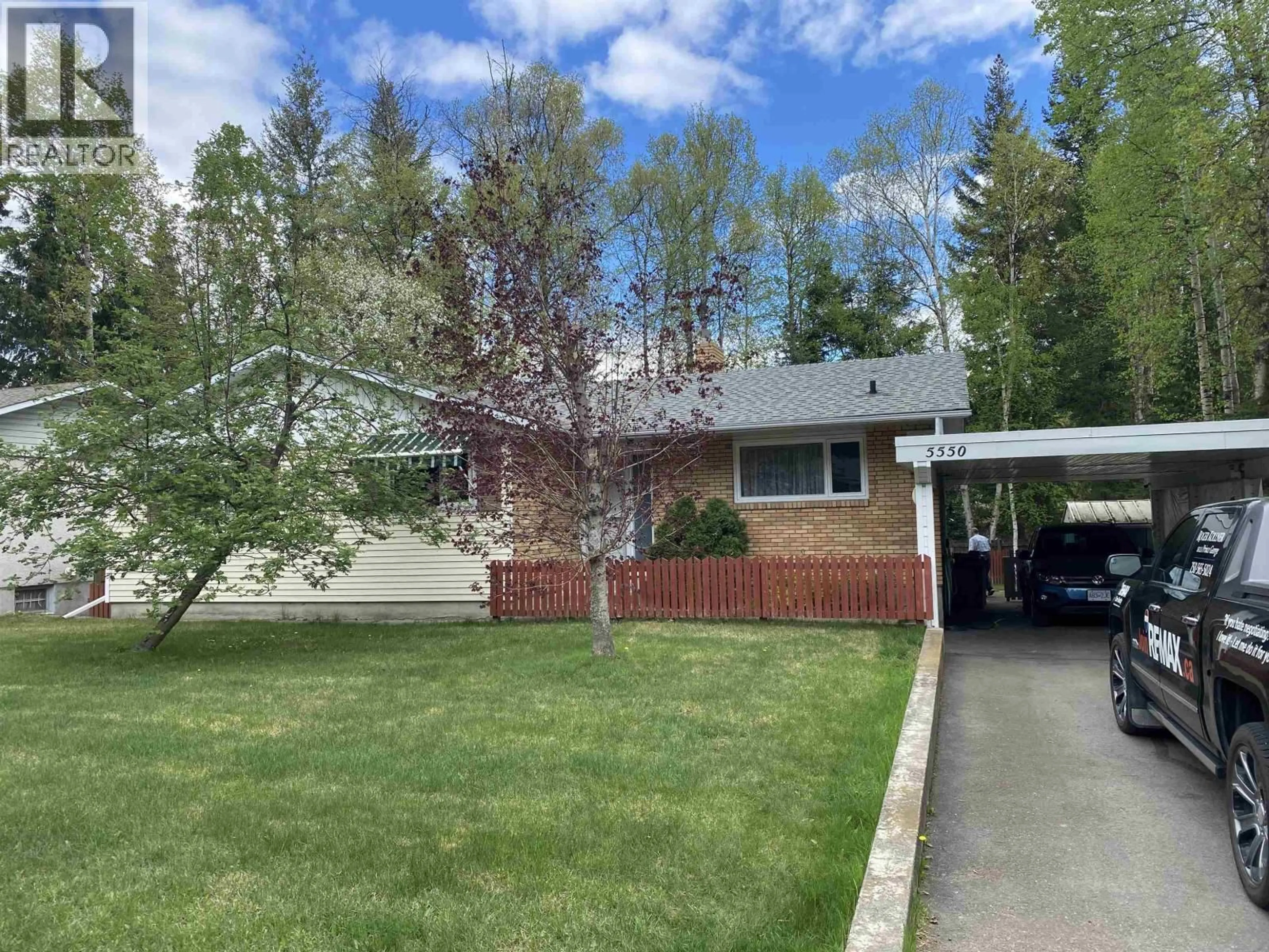 Home with vinyl exterior material, street for 5550 SIMON FRASER AVENUE, Prince George British Columbia V2N2C2