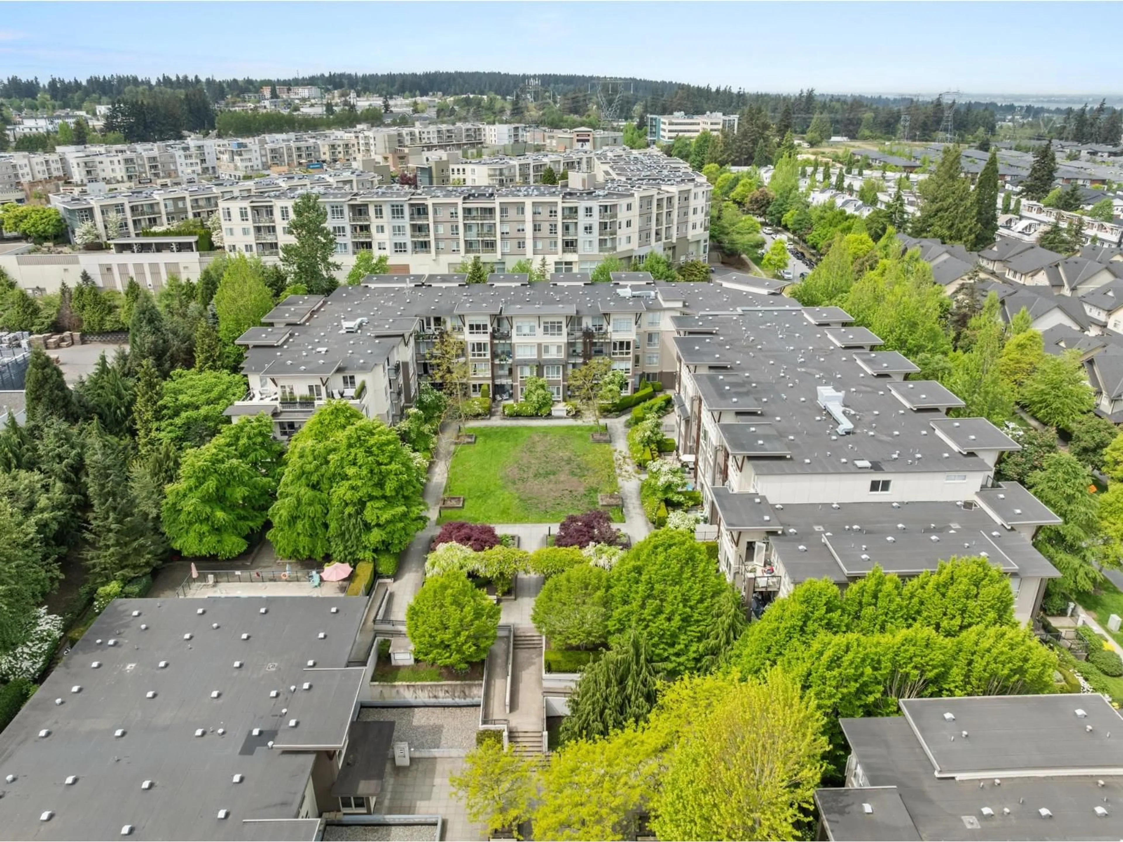 A pic from outside/outdoor area/front of a property/back of a property/a pic from drone, unknown for 406 - 15988 26 AVENUE, Surrey British Columbia V3Z5K3