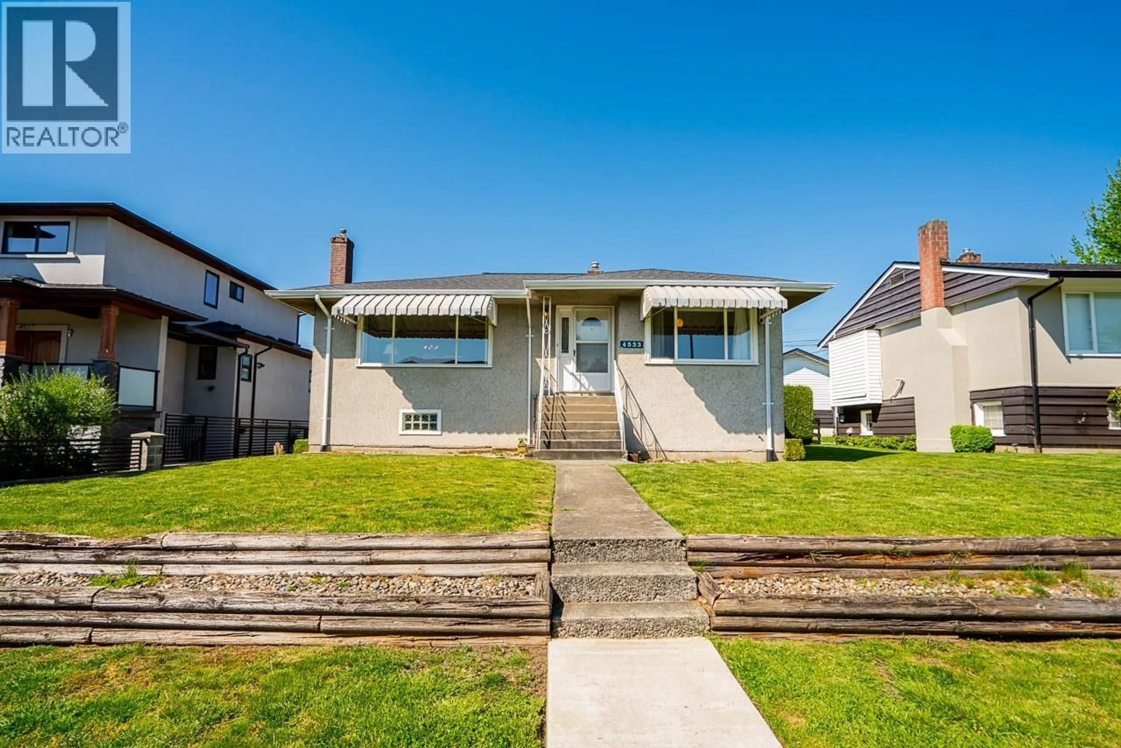 A pic from outside/outdoor area/front of a property/back of a property/a pic from drone, street for 4533 VENABLES STREET, Burnaby British Columbia V5C3A6