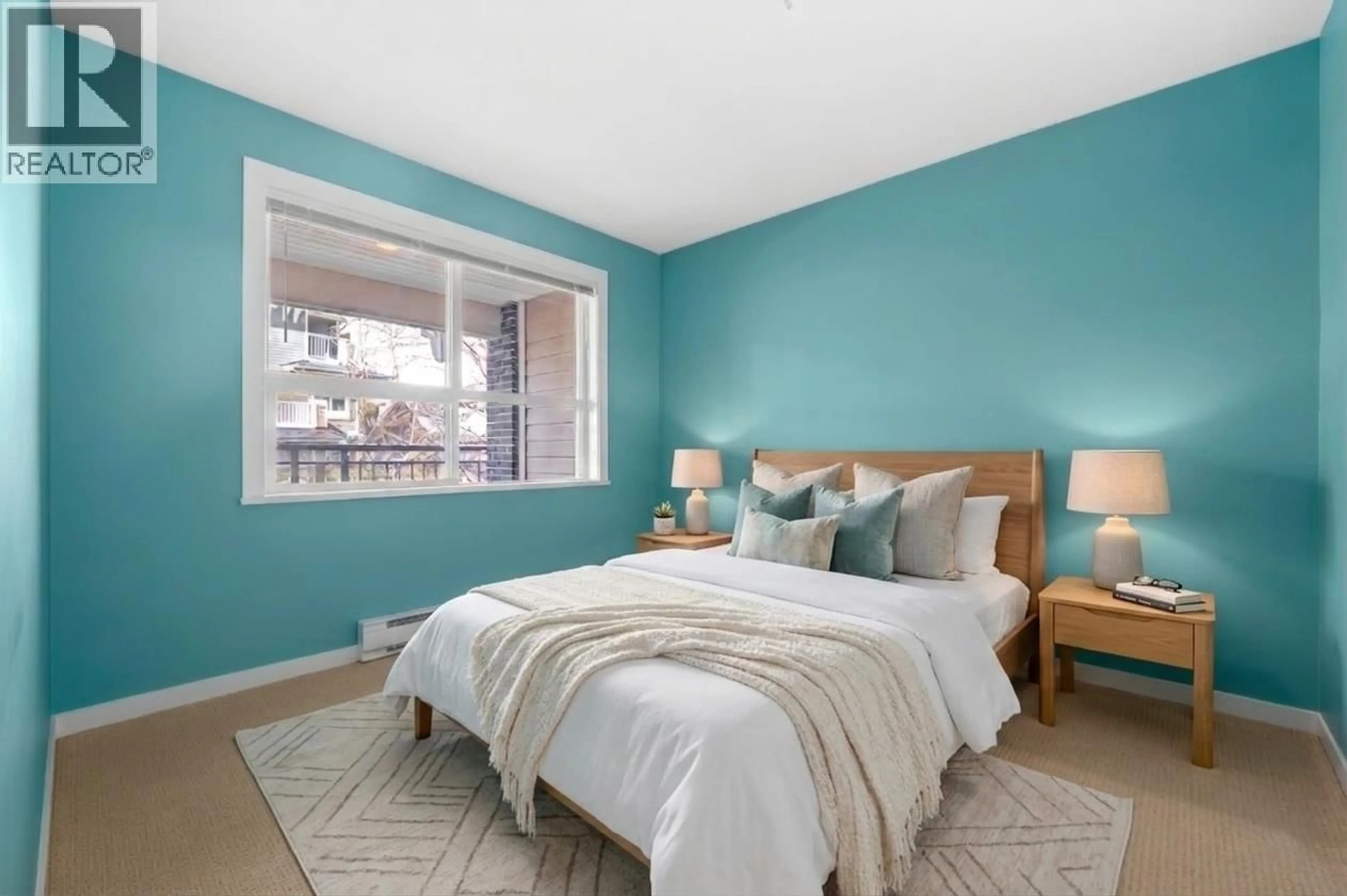 Bedroom with bed, unknown for 205 - 5665 IRMIN STREET, Burnaby British Columbia V5J0C4
