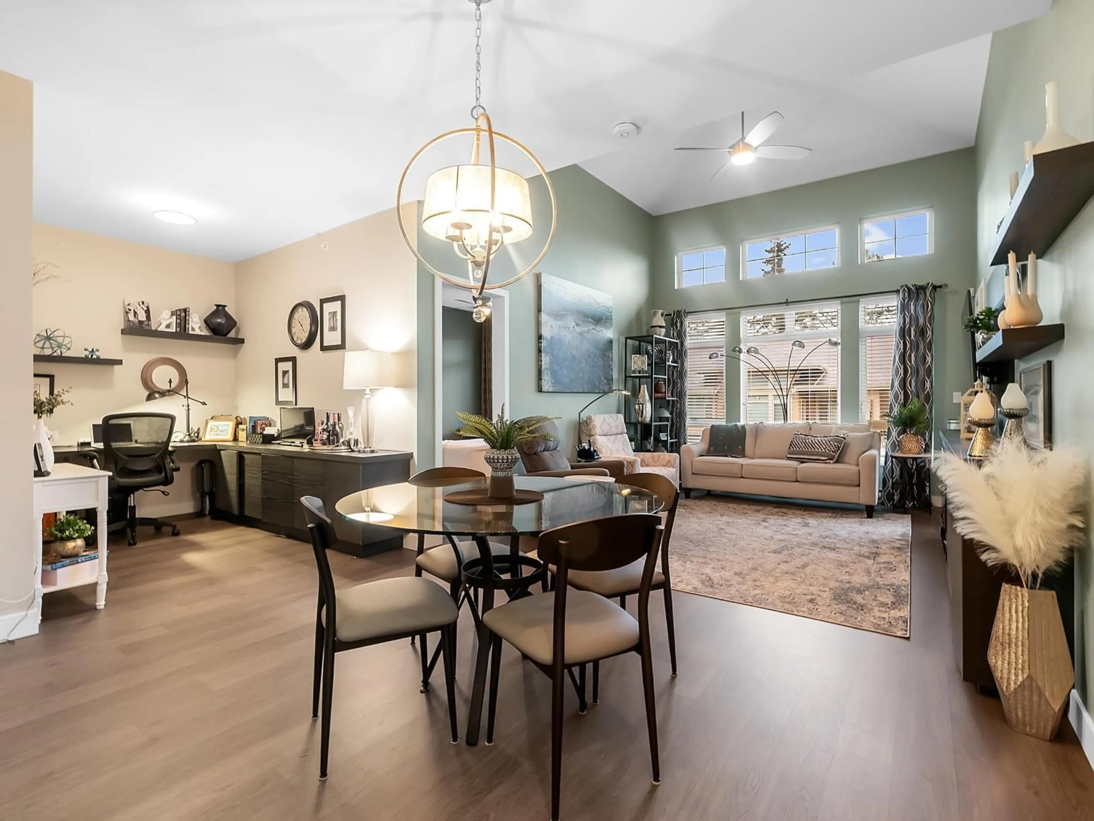 Living room with furniture, wood/laminate floor for 412 - 15360 20 AVENUE, Surrey British Columbia V4A2A3
