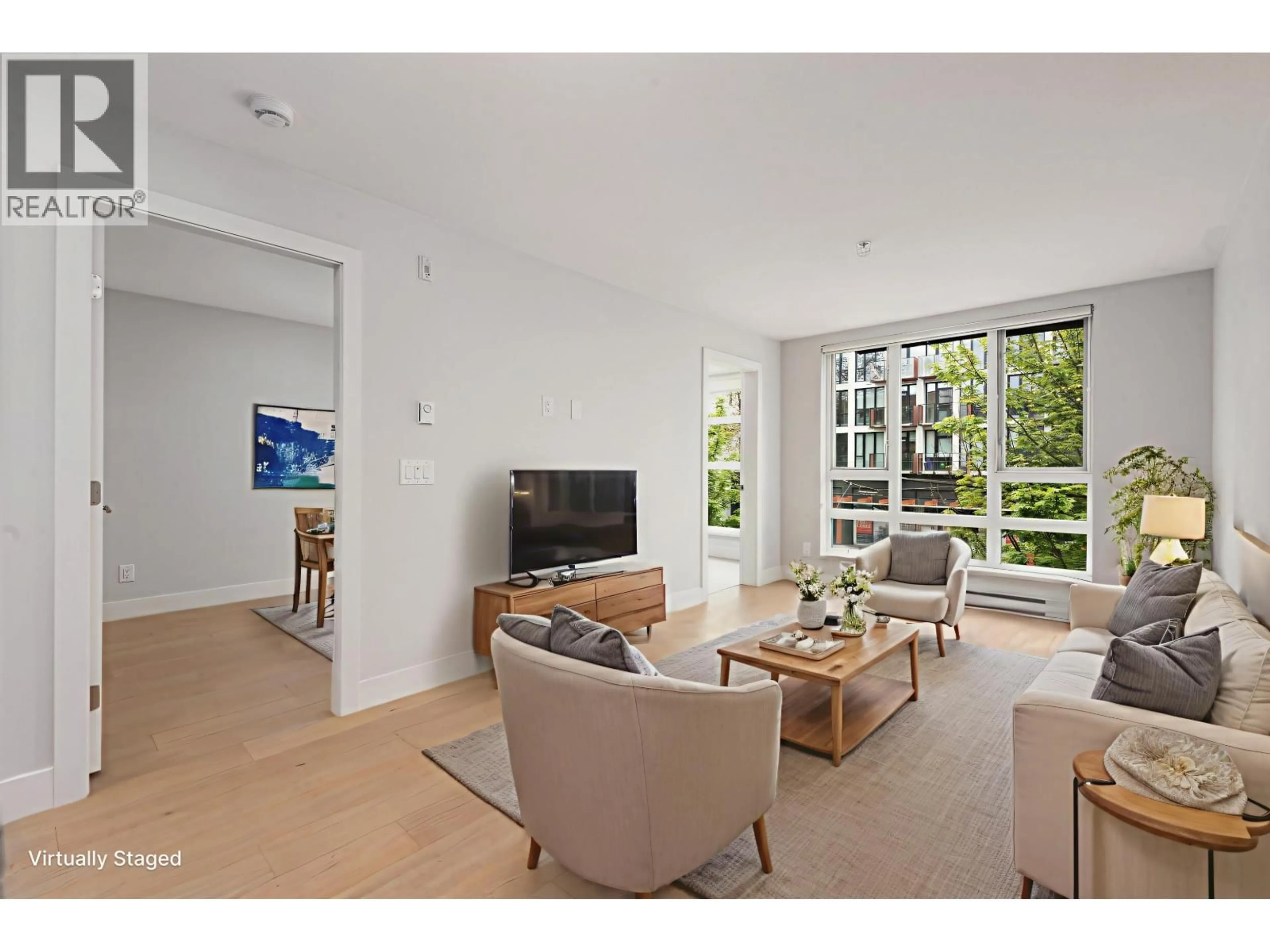 Living room with furniture, unknown for 309 - 2477 CAROLINA STREET, Vancouver British Columbia V5T0G8