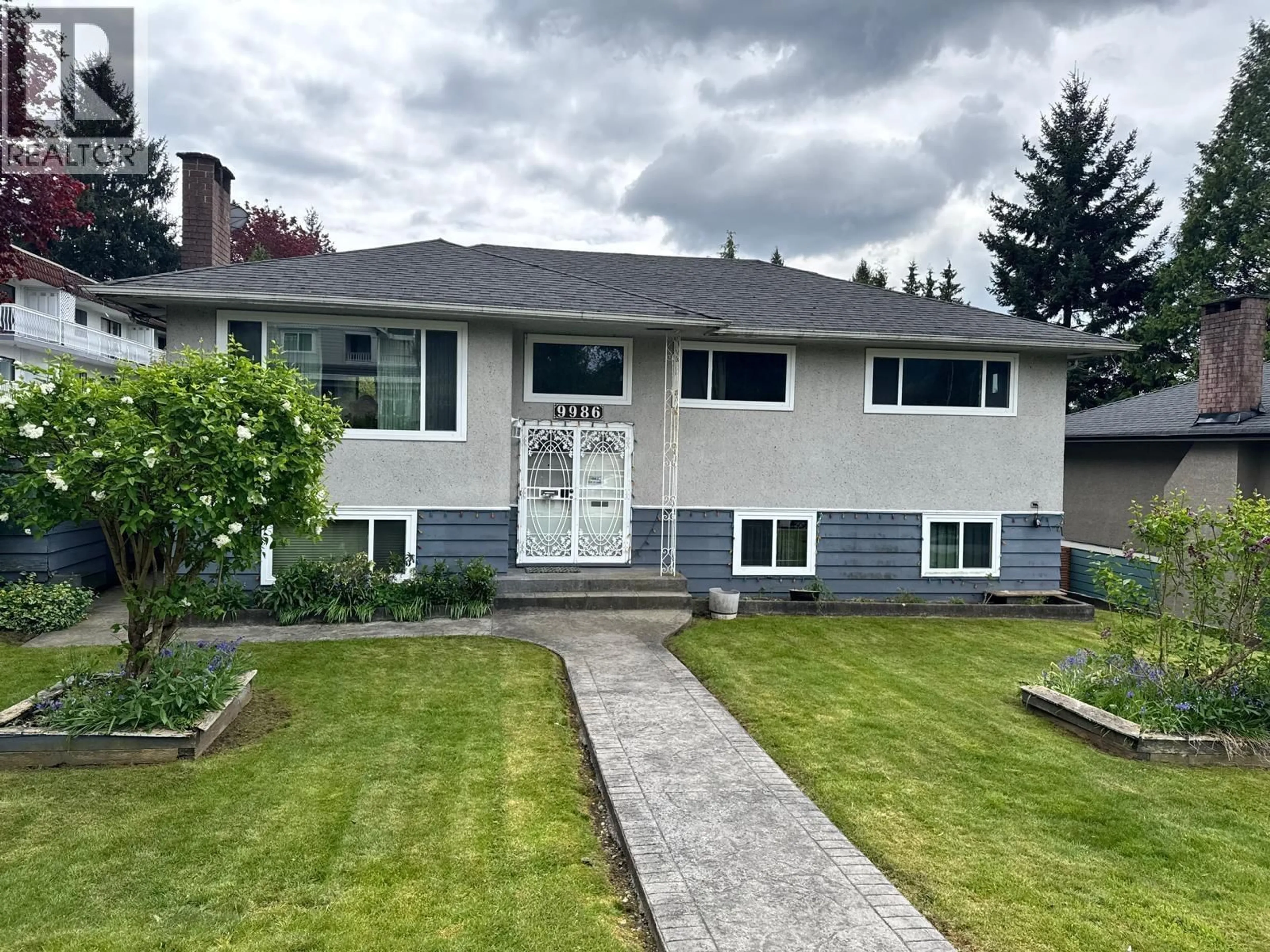 Home with vinyl exterior material, street for 9986 CASEWELL STREET, Burnaby British Columbia V3J1G9