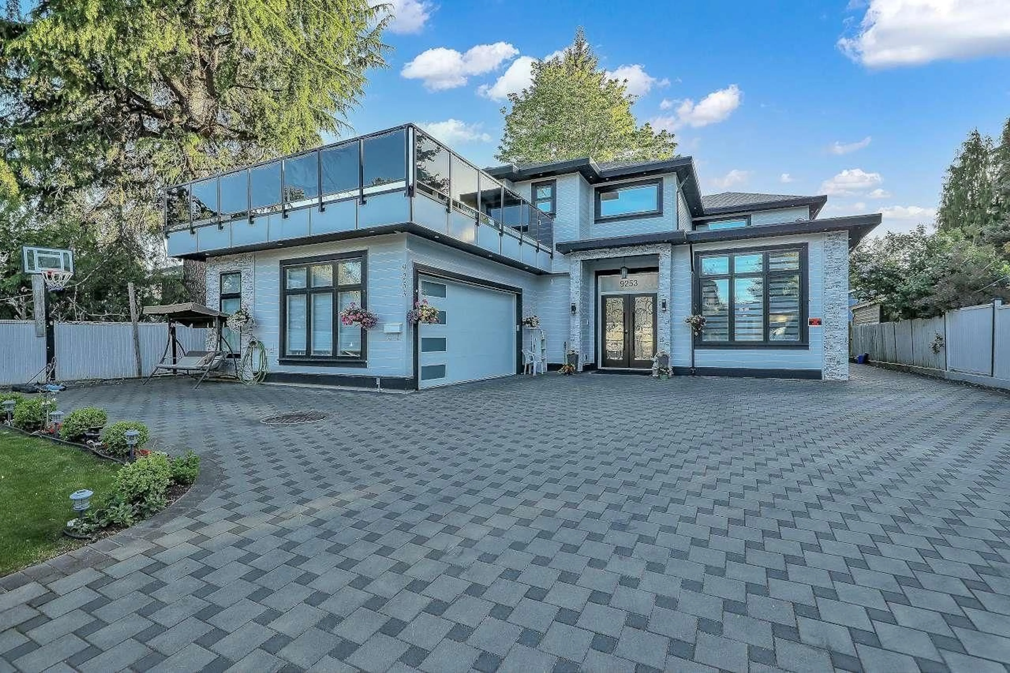 Home with vinyl exterior material, street for 9253 PRINCE CHARLES BOULEVARD, Surrey British Columbia V3V1S4
