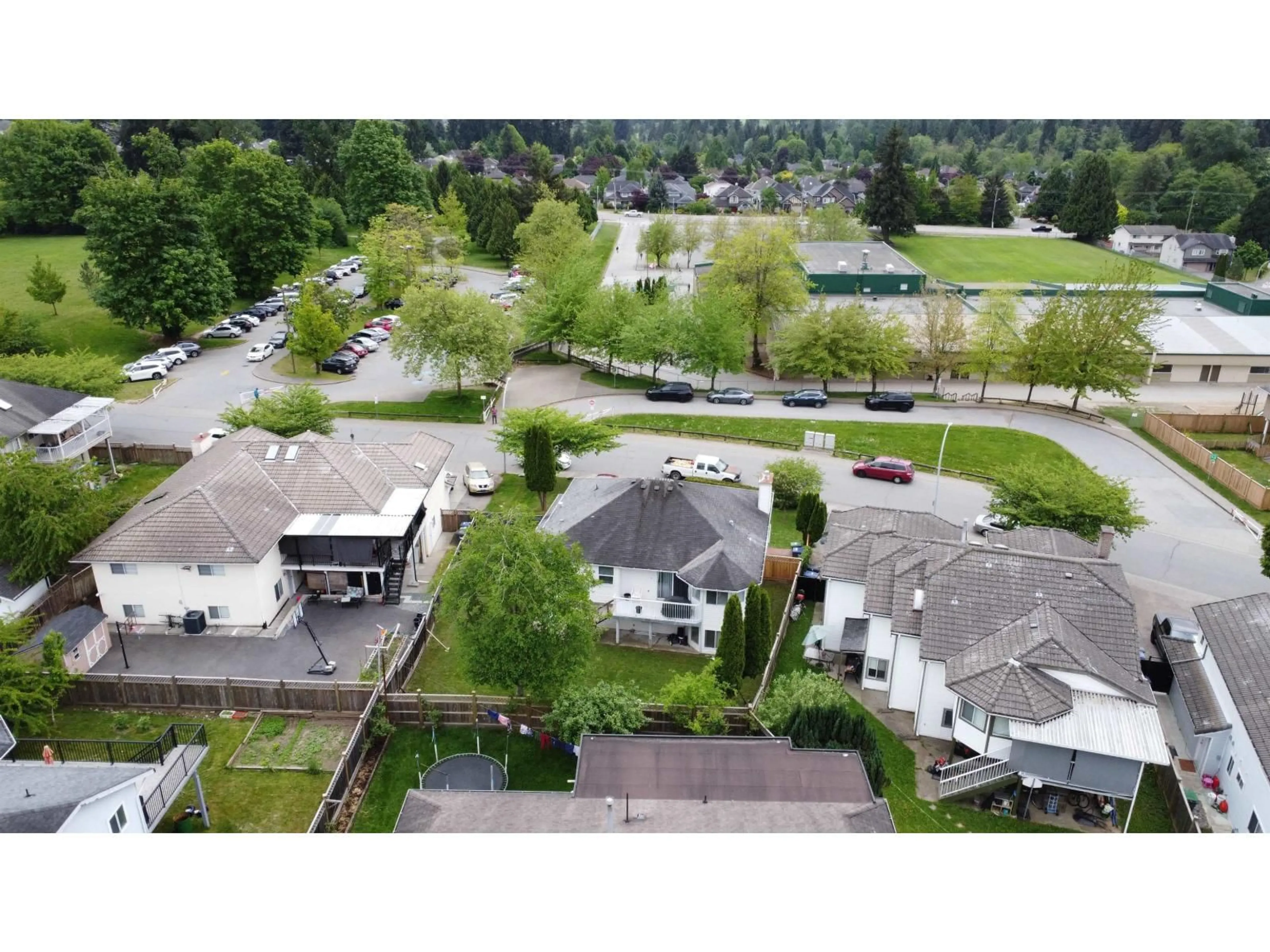 A pic from outside/outdoor area/front of a property/back of a property/a pic from drone, street for 14919 SPENSER DRIVE, Surrey British Columbia V3M7K7