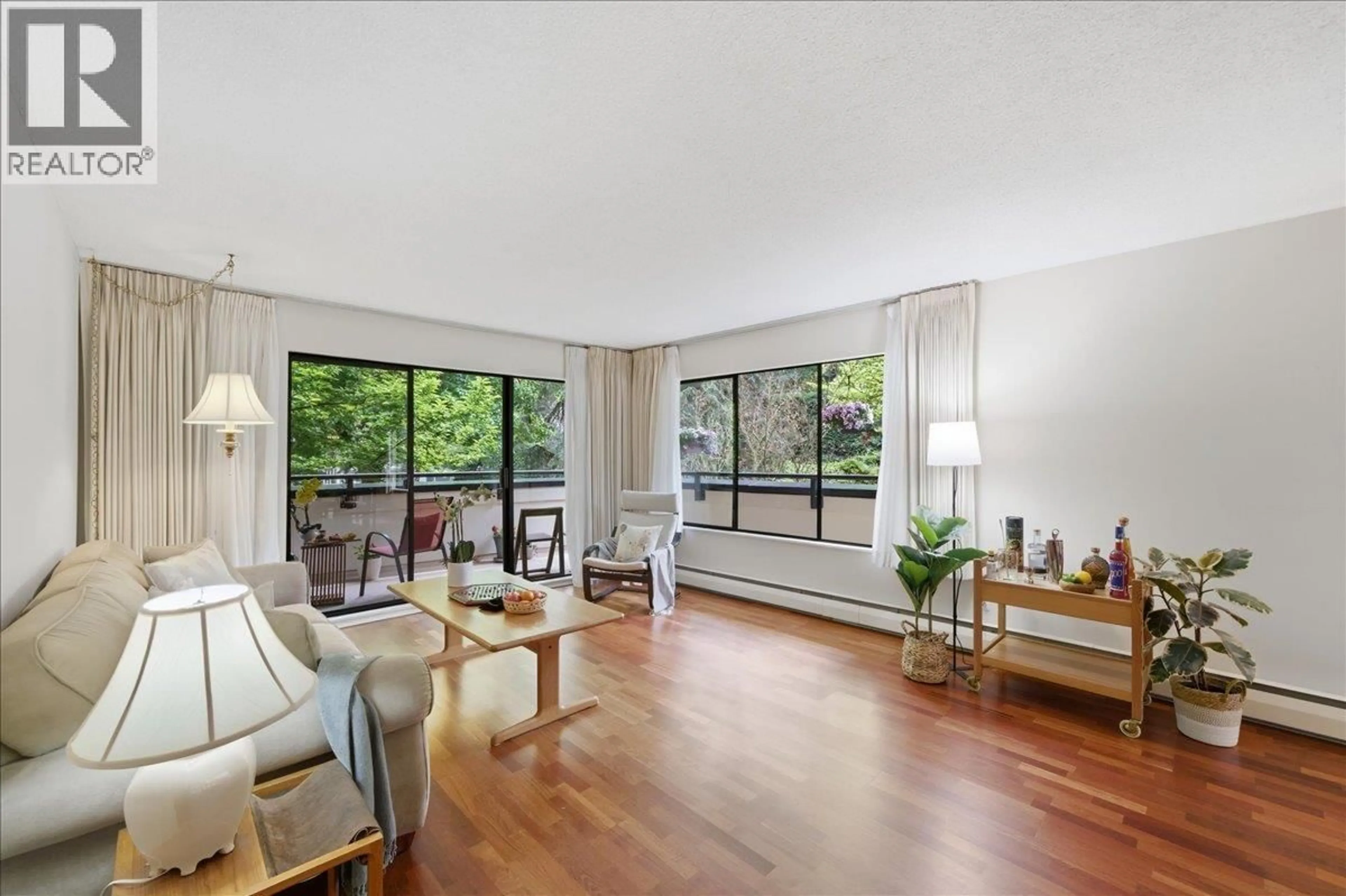 Living room with furniture, wood/laminate floor for 202 - 1710 13TH AVENUE, Vancouver British Columbia V6J2H1