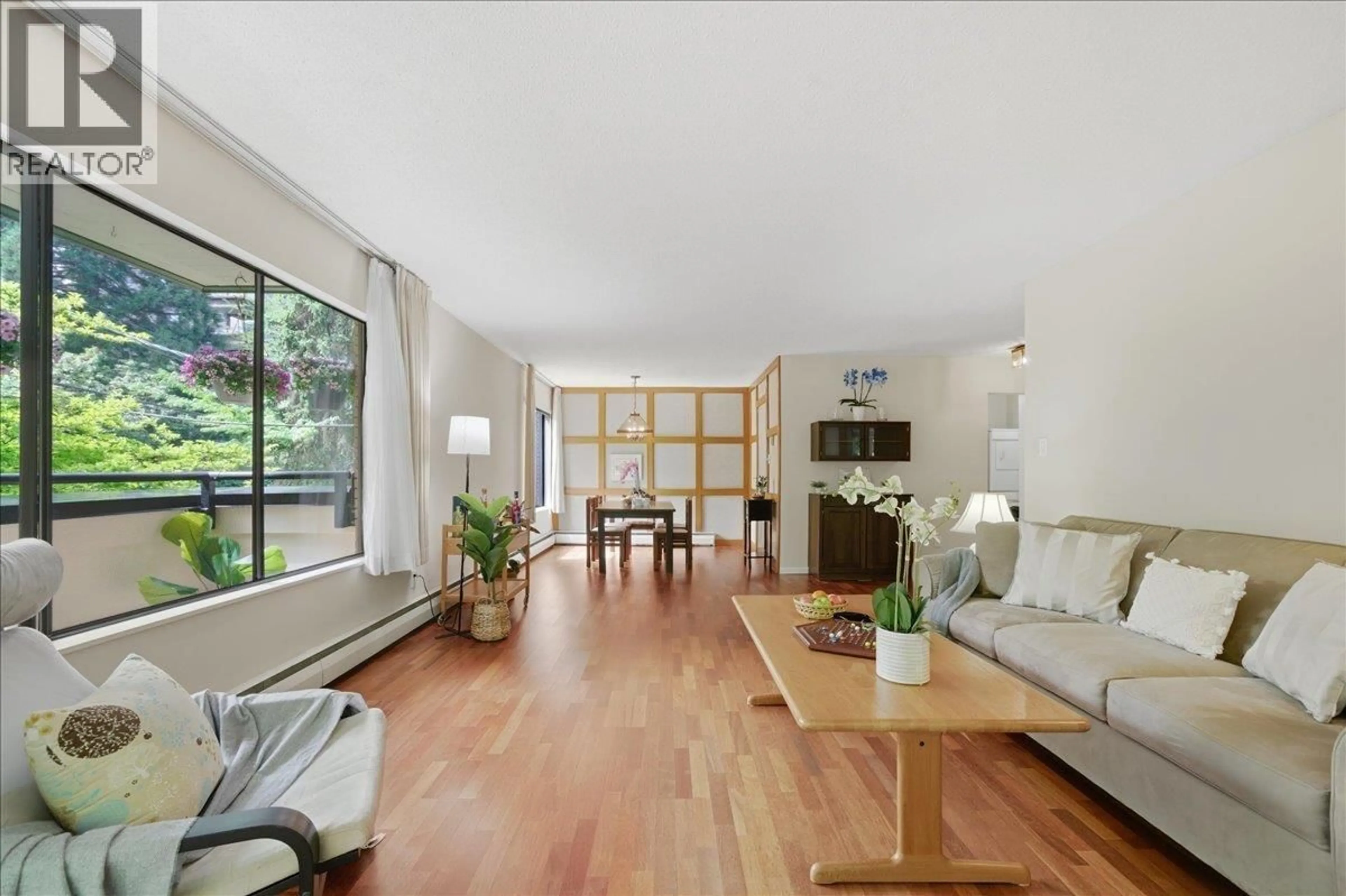 Living room with furniture, wood/laminate floor for 202 - 1710 13TH AVENUE, Vancouver British Columbia V6J2H1