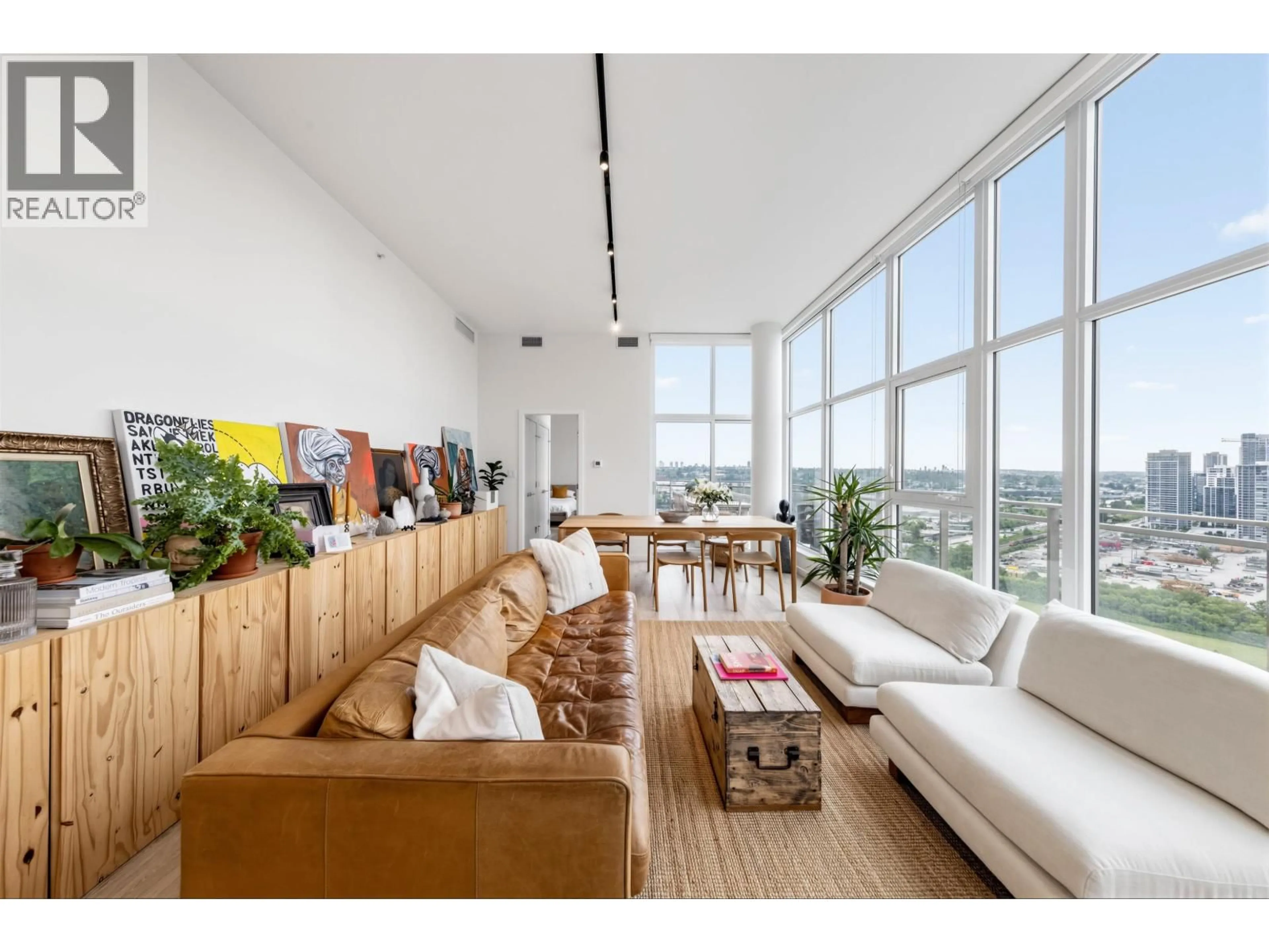 Living room with furniture, wood/laminate floor for 2601 - 5311 GORING STREET, Burnaby British Columbia V5B0B5