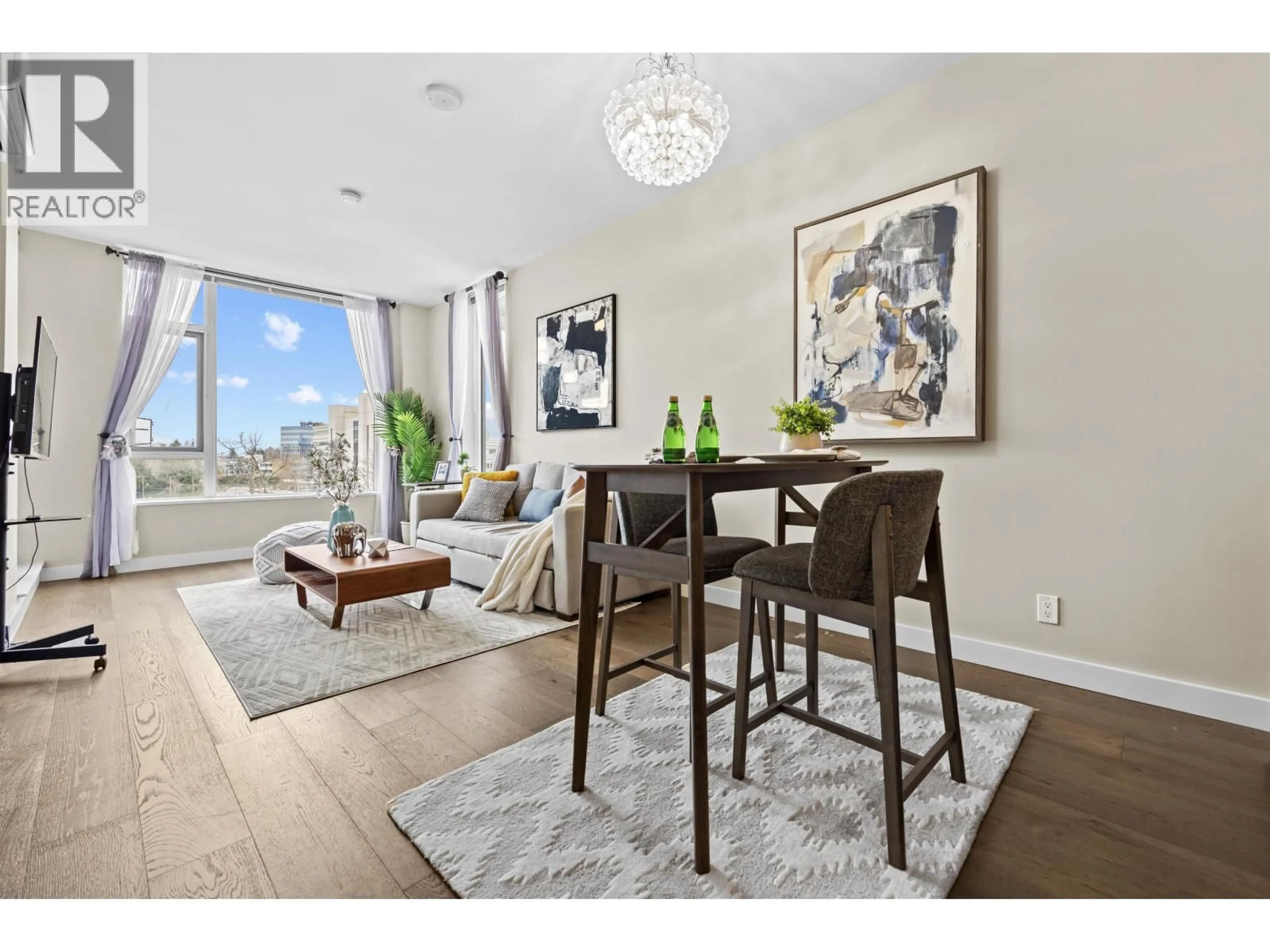 Living room with furniture, wood/laminate floor for 3018 - 5511 HOLLYBRIDGE WAY, Richmond British Columbia V7C4N3