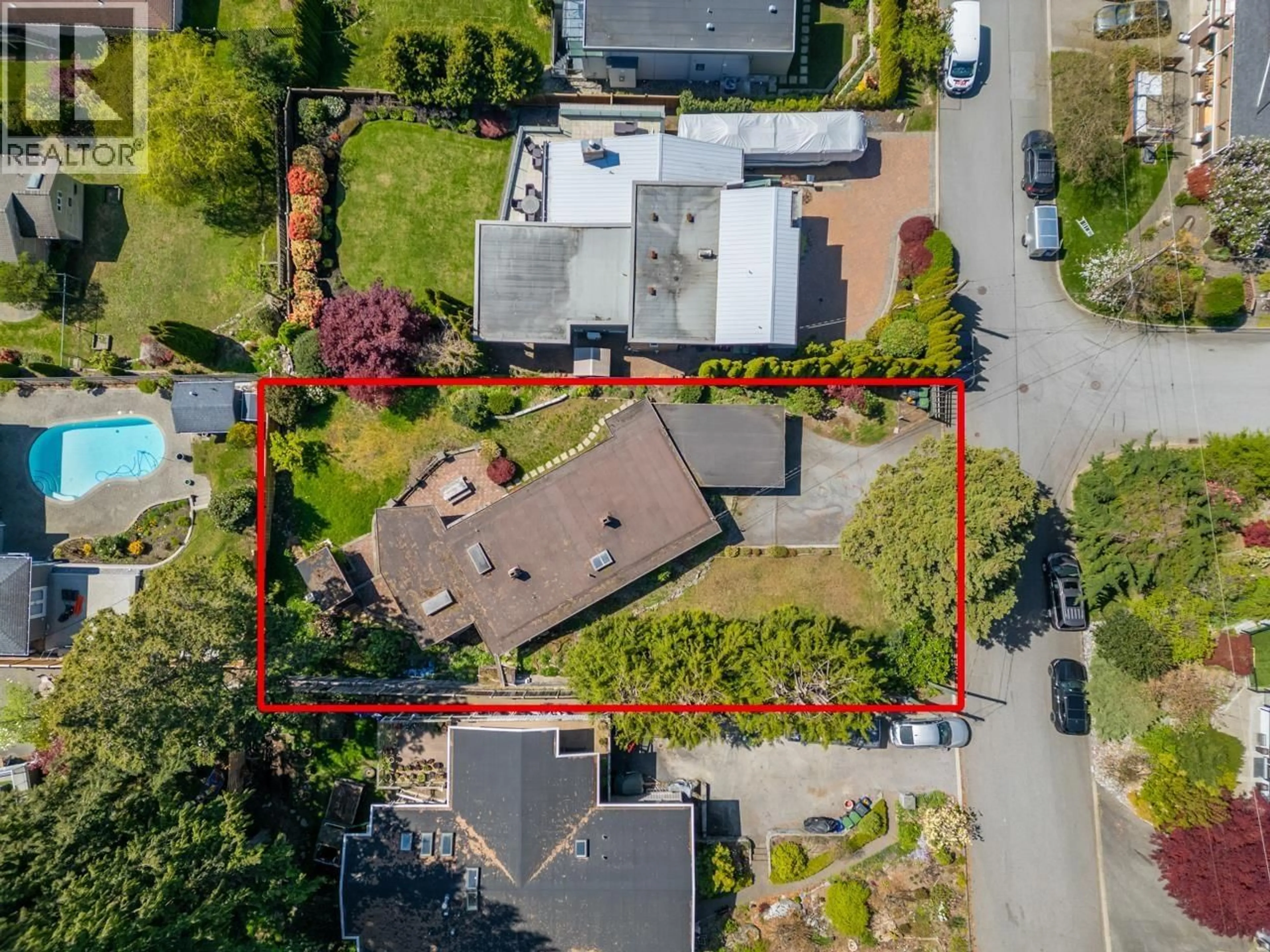 A pic from outside/outdoor area/front of a property/back of a property/a pic from drone, street for 241 BALMORAL ROAD, North Vancouver British Columbia V7N2T9