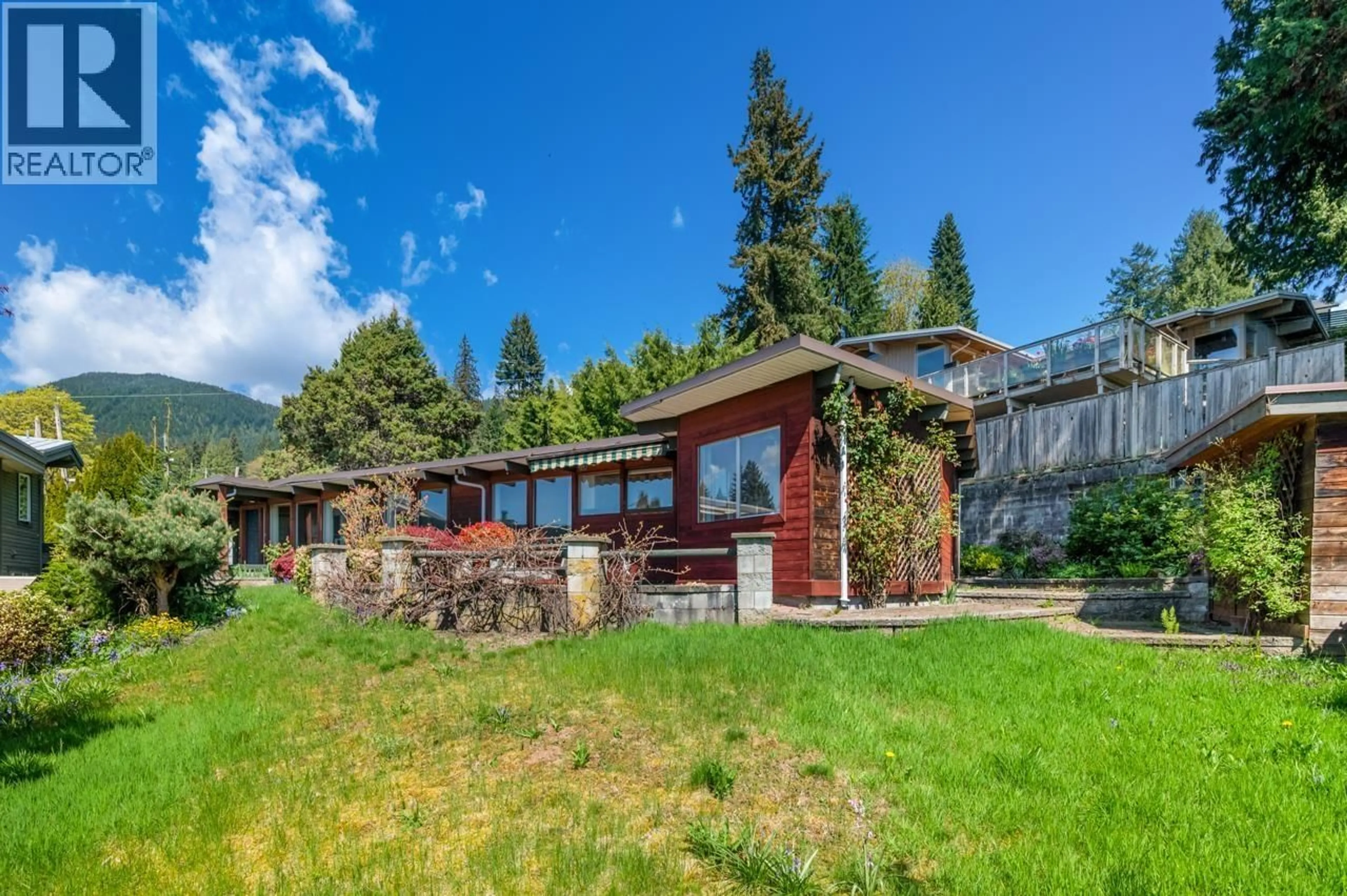 A pic from outside/outdoor area/front of a property/back of a property/a pic from drone, water/lake/river/ocean view for 241 BALMORAL ROAD, North Vancouver British Columbia V7N2T9