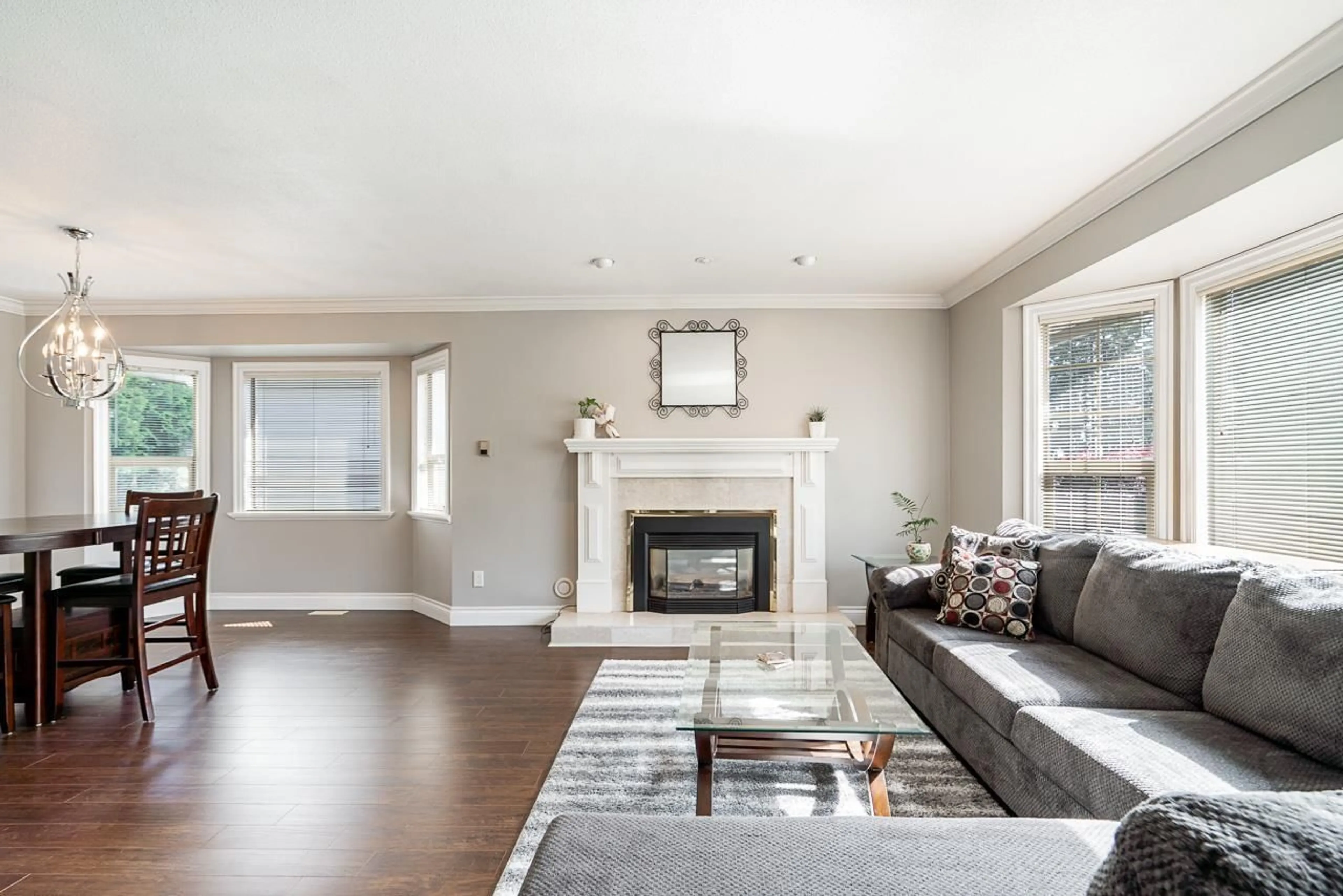 Living room with furniture, wood/laminate floor for 7888 GARFIELD DRIVE, Delta British Columbia V4C7J4