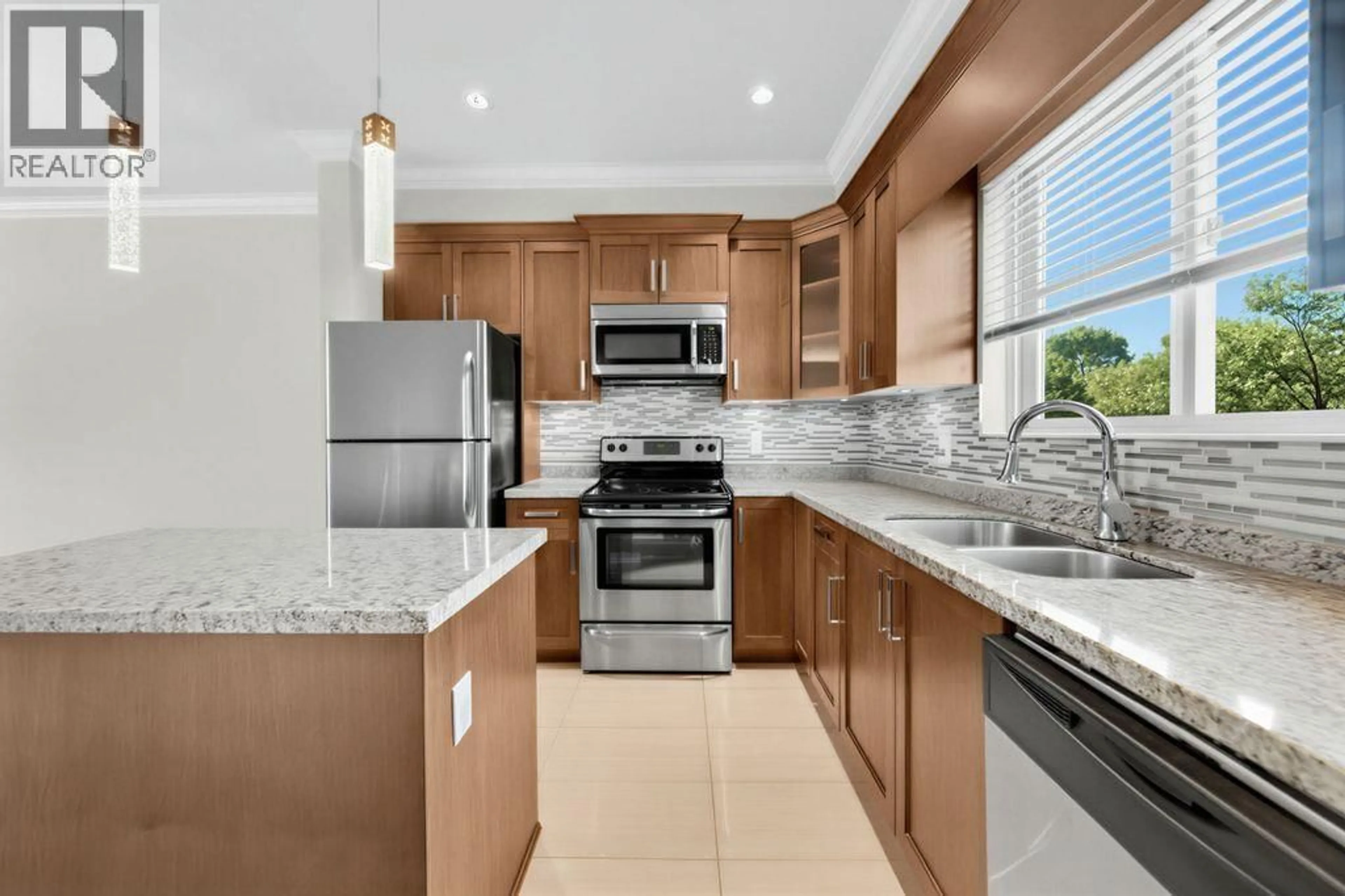 Open concept kitchen, ceramic/tile floor for 203A - 7159 STRIDE AVENUE, Burnaby British Columbia V3N1T8