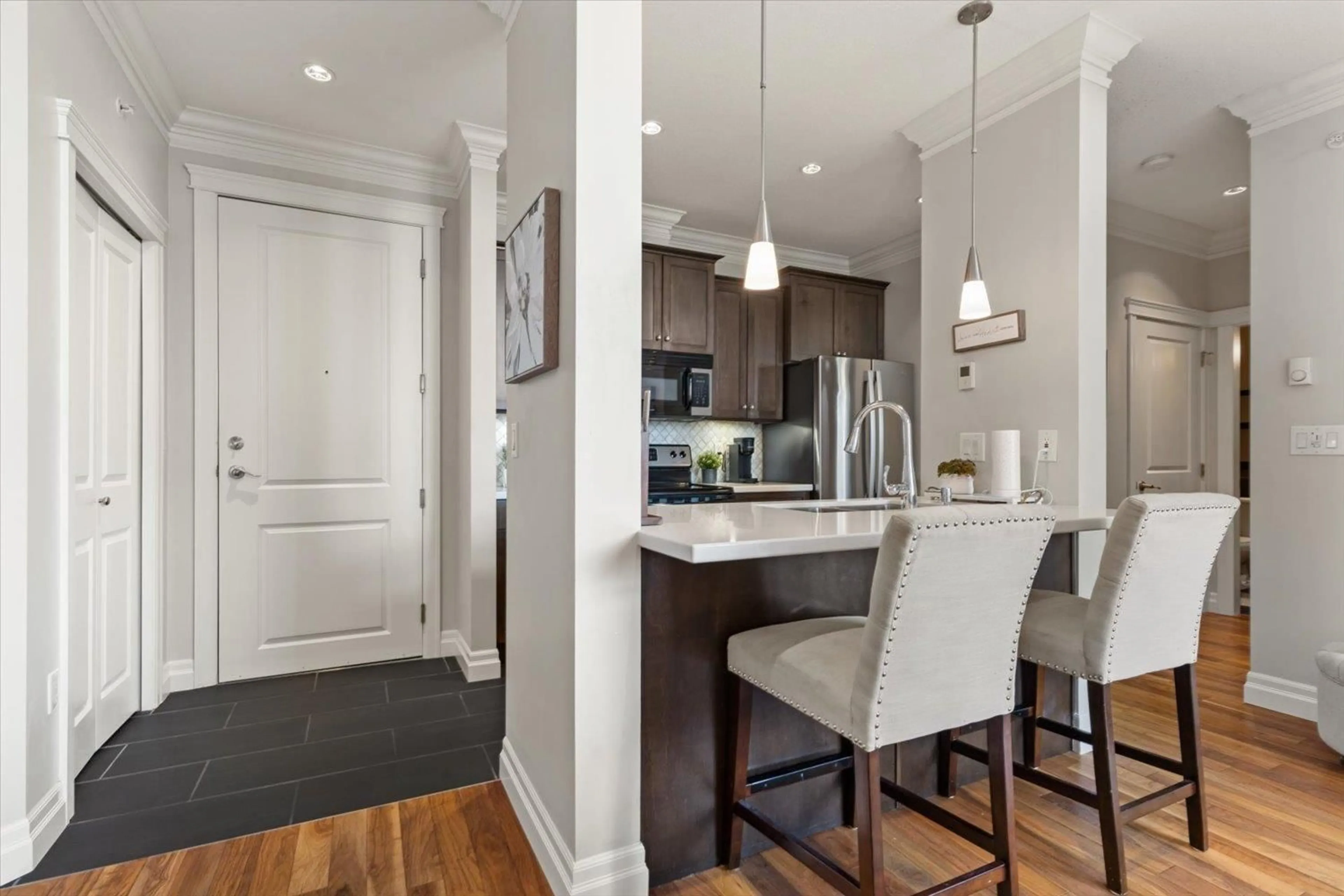 Open concept kitchen, wood/laminate floor for 409C - 45595 TAMIHI WAY, Chilliwack British Columbia V2R0G3