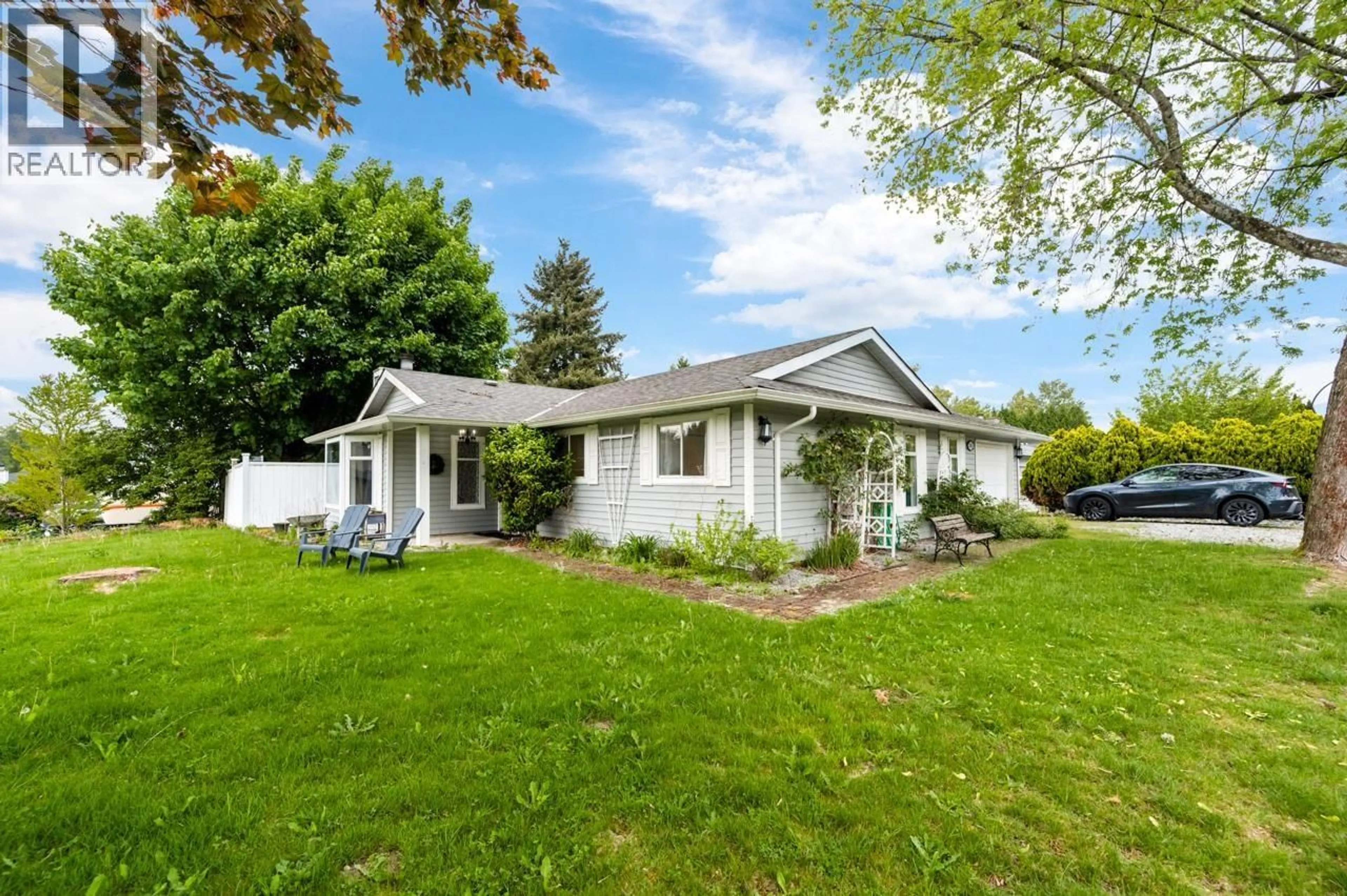 Home with vinyl exterior material, street for 22641 KENDRICK LOOP, Maple Ridge British Columbia V2X8Y9