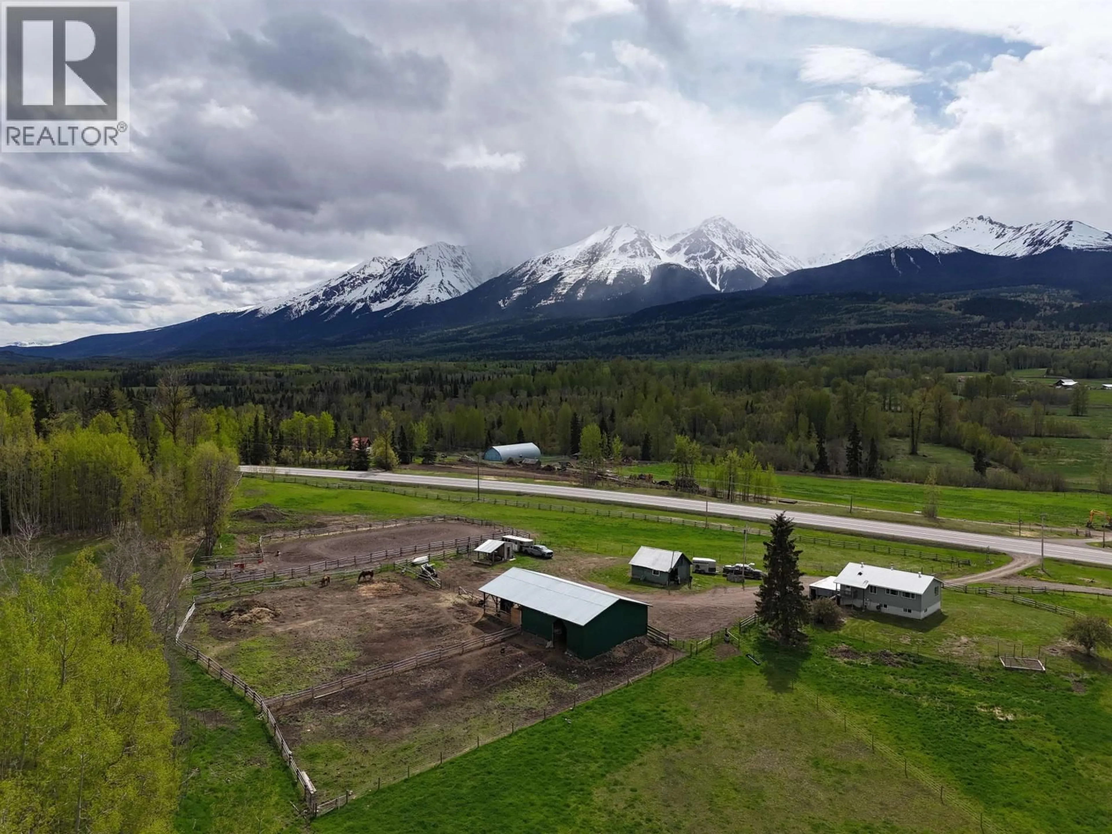 A pic from outside/outdoor area/front of a property/back of a property/a pic from drone, mountain view for 21872 16 HIGHWAY, Smithers British Columbia V0J2N1