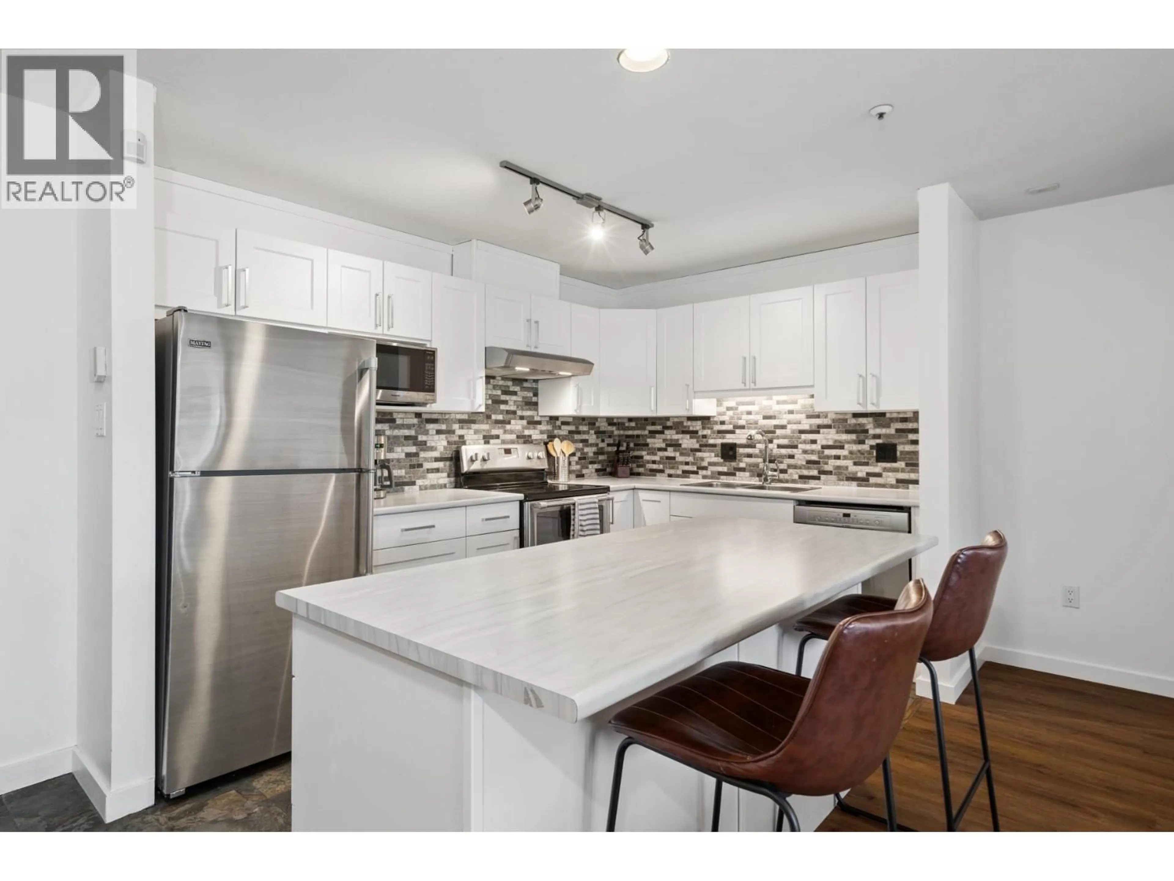 Open concept kitchen, unknown for 413 - 2968 BURLINGTON DRIVE, Coquitlam British Columbia V3B7N4