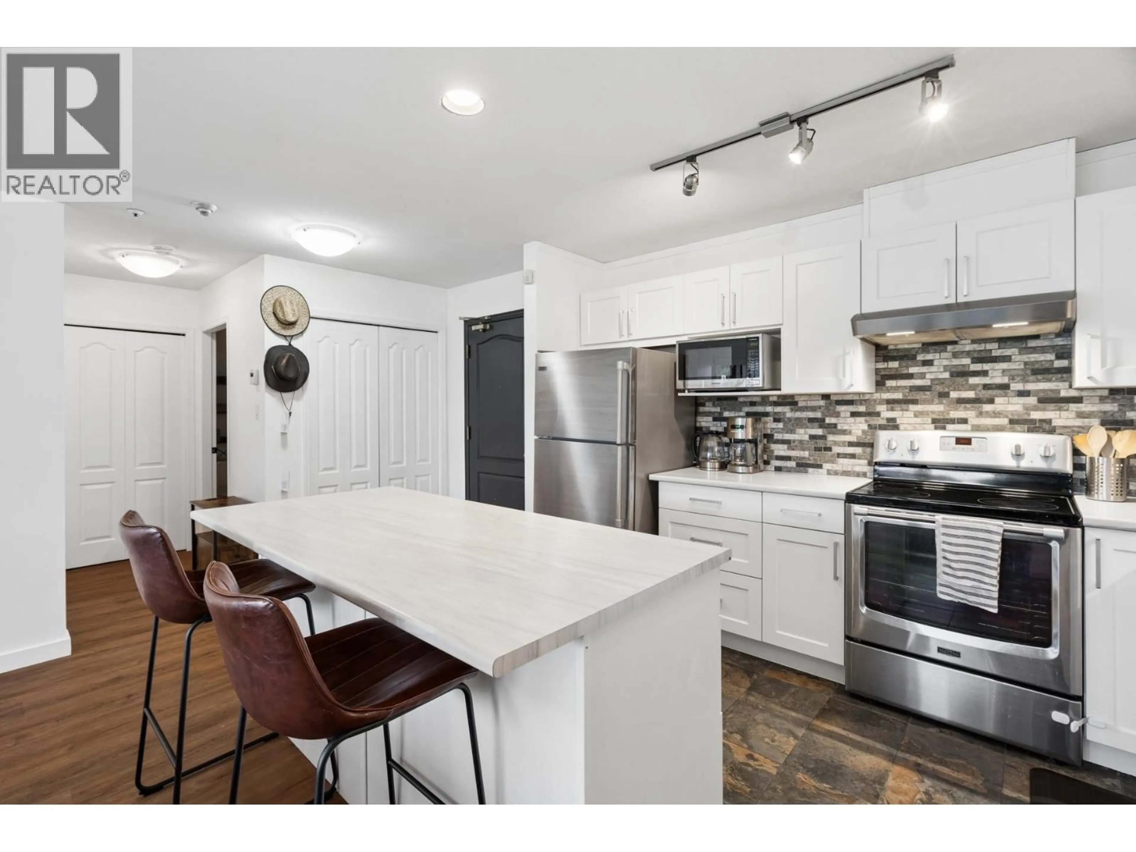 Open concept kitchen, unknown for 413 - 2968 BURLINGTON DRIVE, Coquitlam British Columbia V3B7N4
