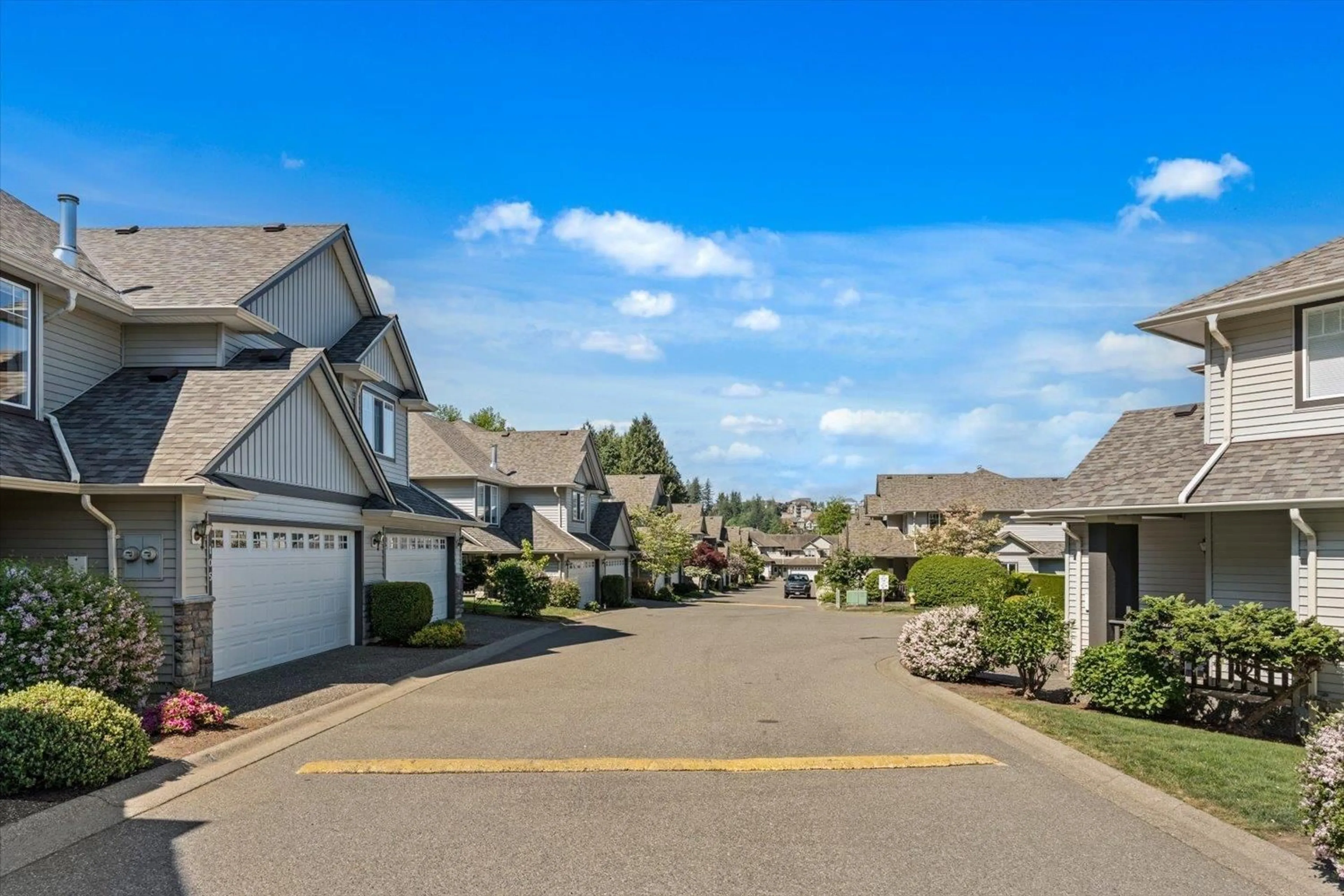 A pic from outside/outdoor area/front of a property/back of a property/a pic from drone, street for 105 - 46360 VALLEYVIEW ROAD, Chilliwack British Columbia V2R5L7