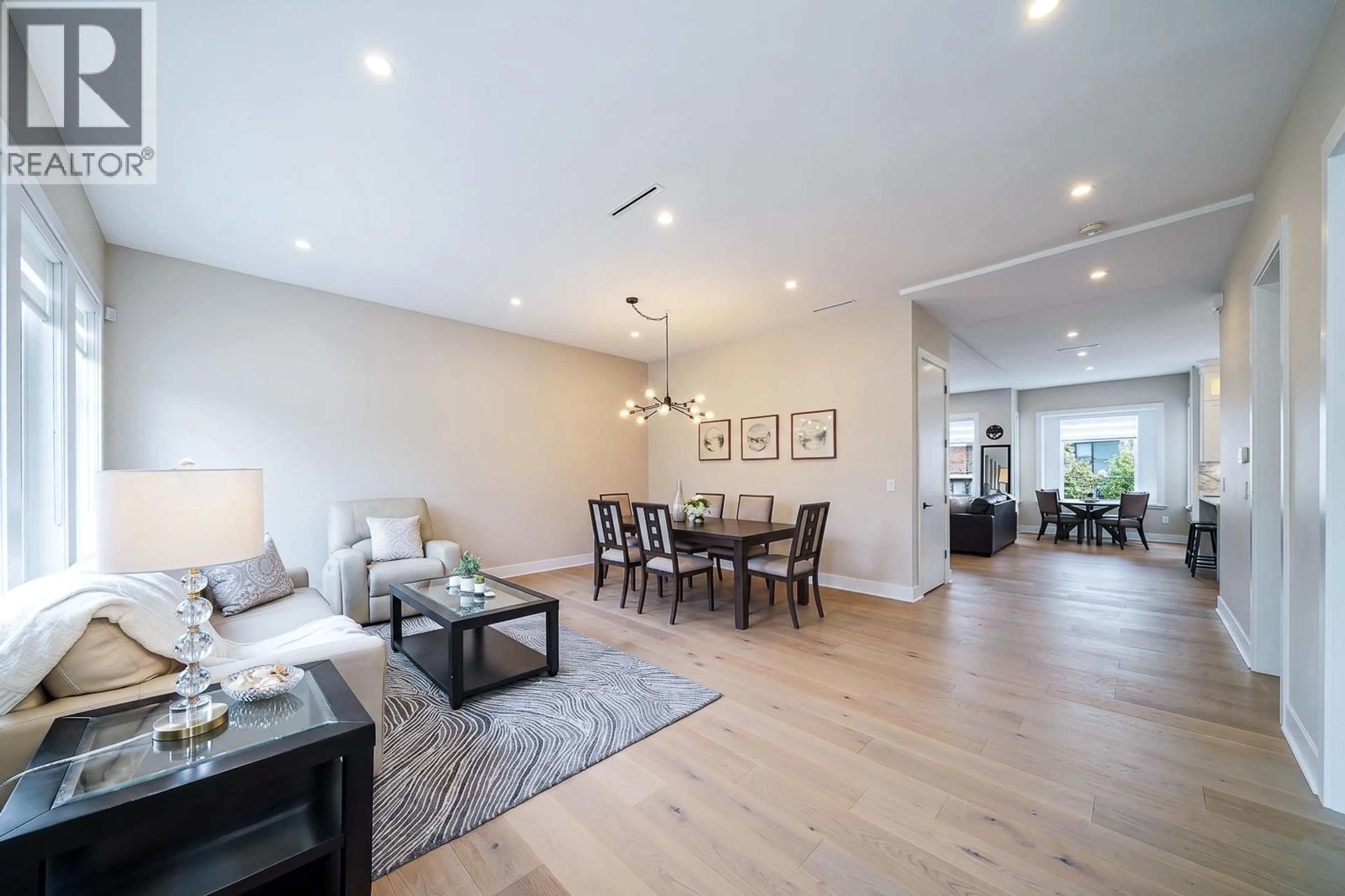 Living room with furniture, wood/laminate floor for 4643 BOND STREET, Burnaby British Columbia V5H1G7