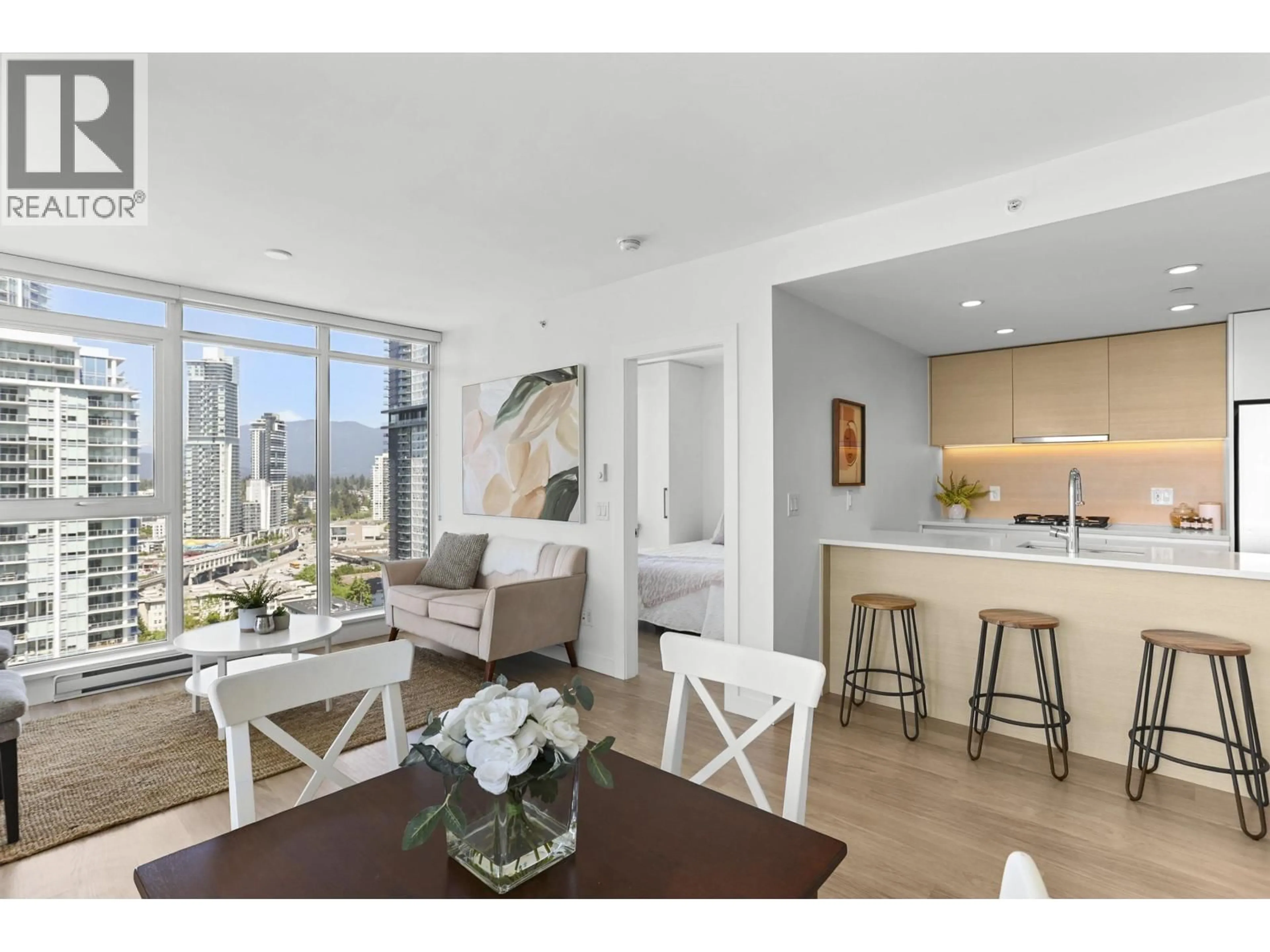 Open concept kitchen, wood/laminate floor for 2409 - 657 WHITING WAY, Coquitlam British Columbia V3J0J6
