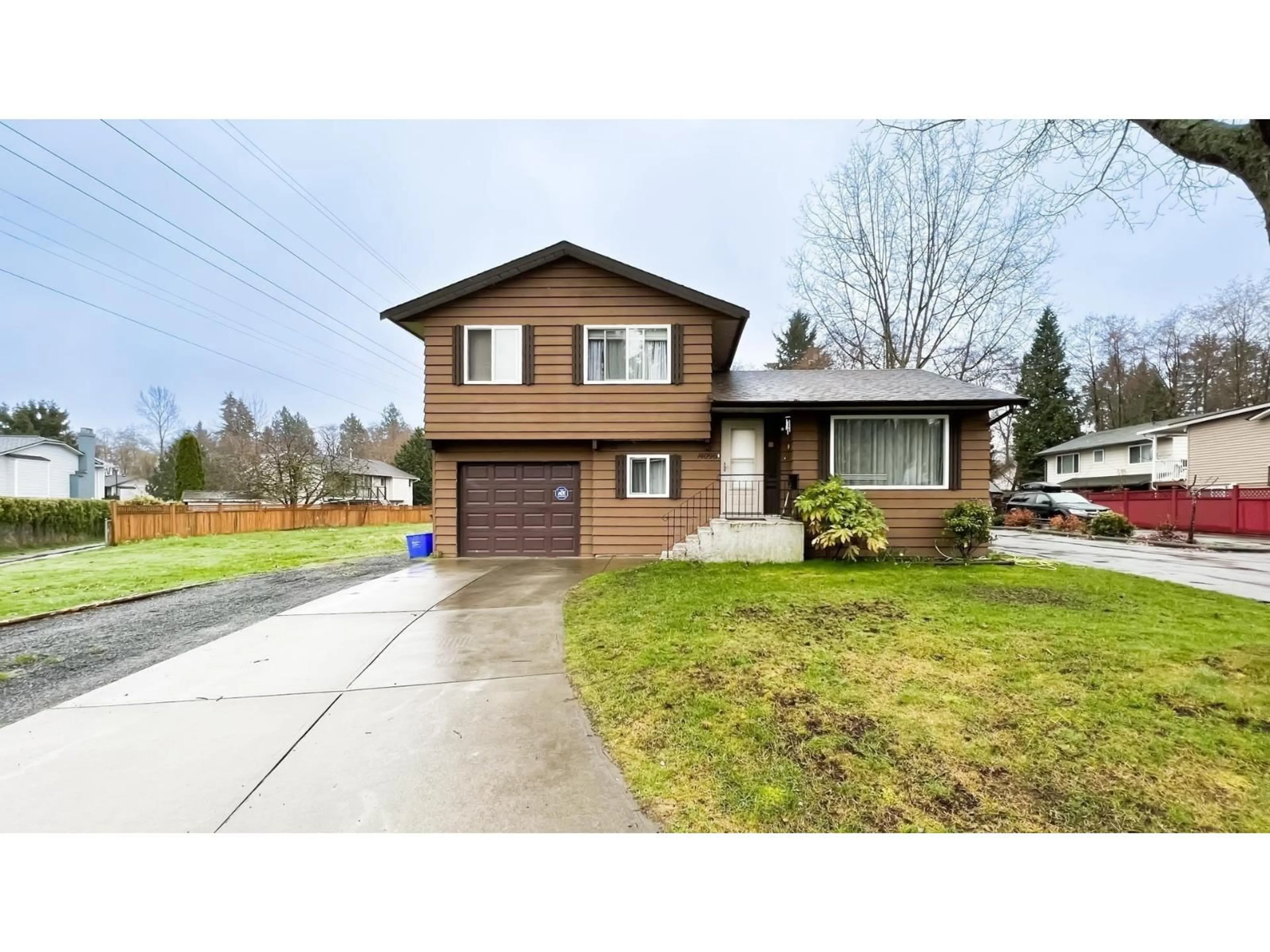 Home with vinyl exterior material, street for 14096 66A AVENUE, Surrey British Columbia V3W6M4