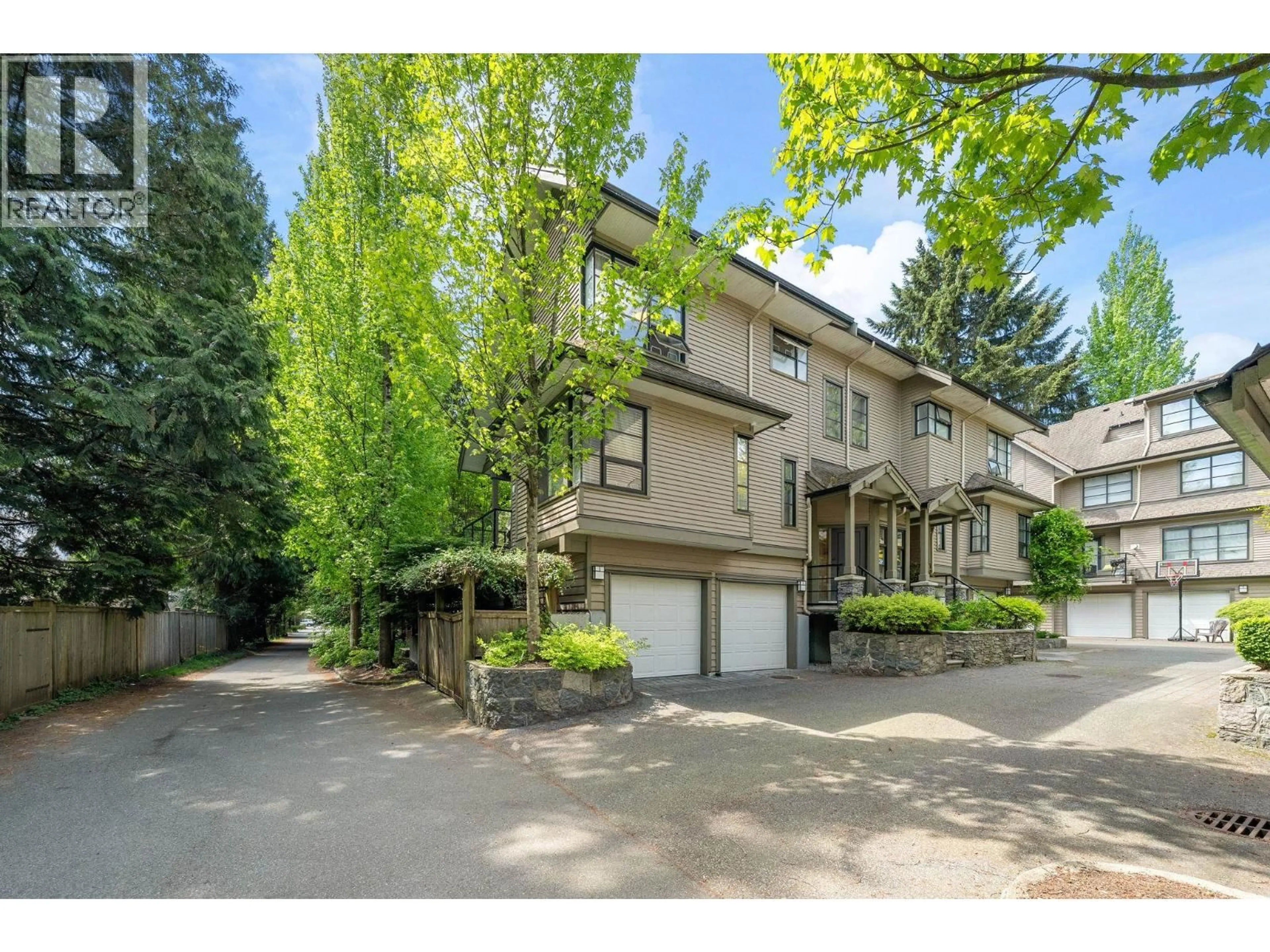 A pic from outside/outdoor area/front of a property/back of a property/a pic from drone, street for 15 - 3150 SUNNYHURST ROAD, North Vancouver British Columbia V7K2G3