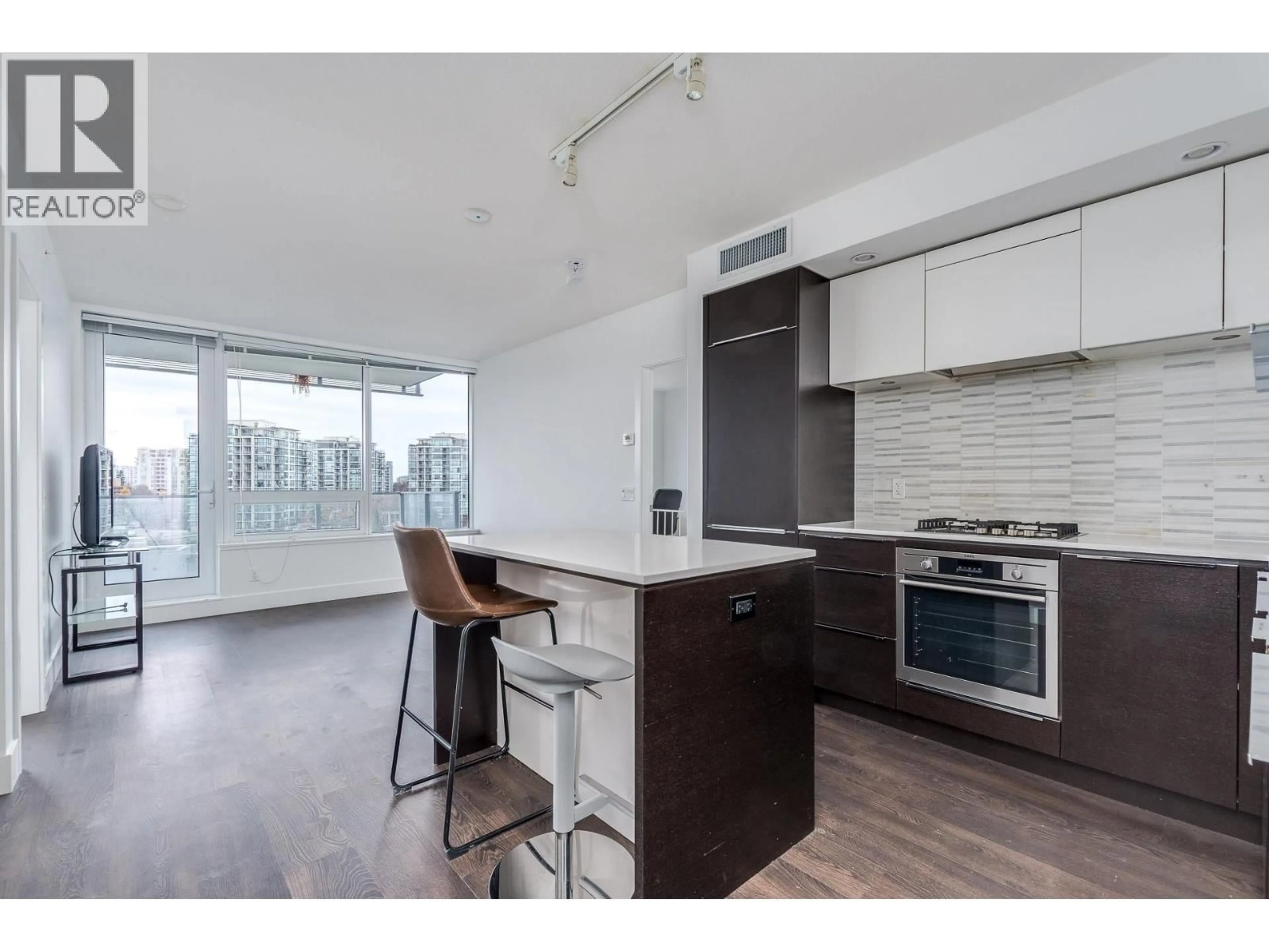 Open concept kitchen, wood/laminate floor for 903 - 5233 GILBERT ROAD, Richmond British Columbia V7C0B3