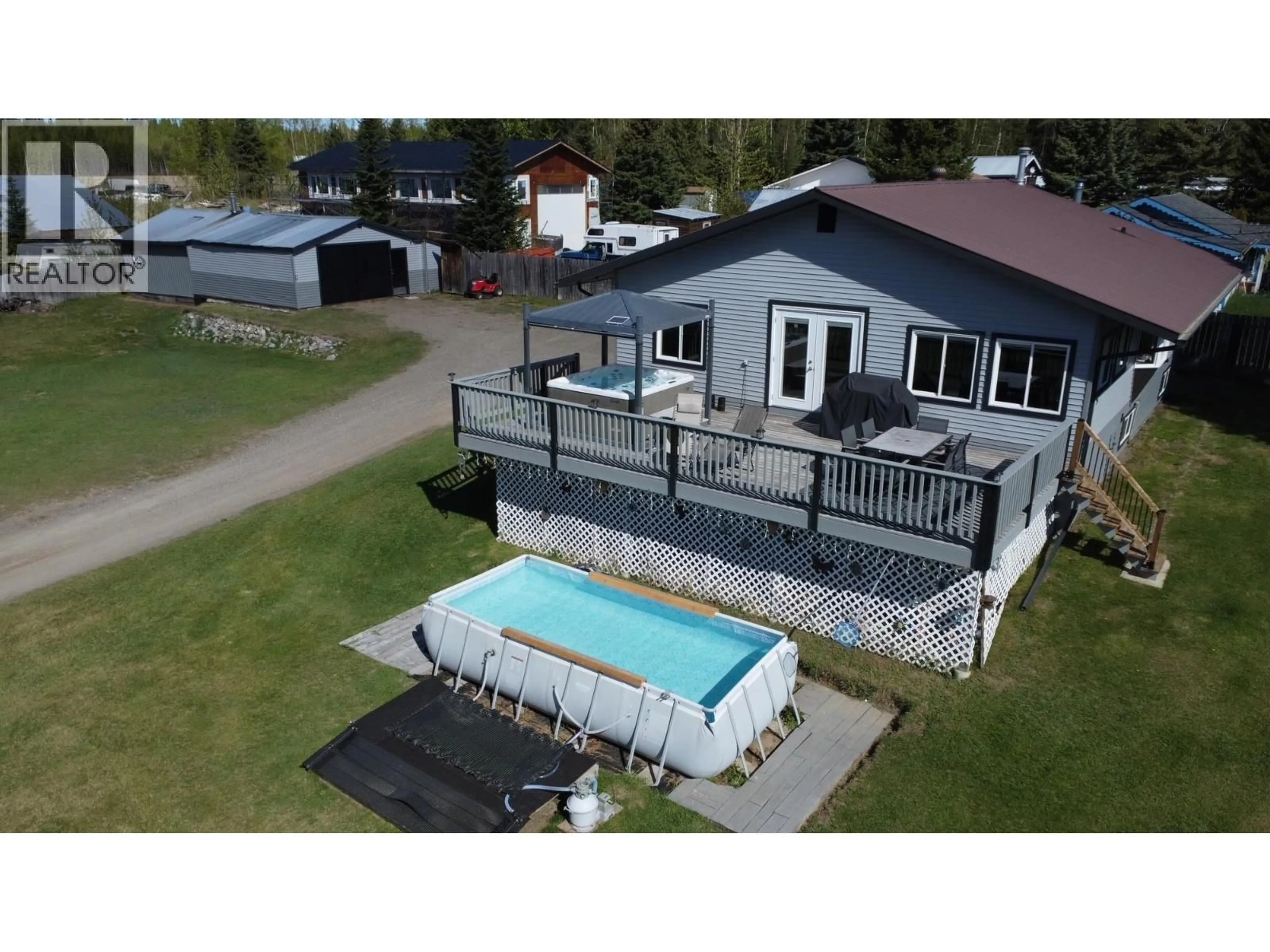 A pic from outside/outdoor area/front of a property/back of a property/a pic from drone, water/lake/river/ocean view for 7687 SABYAM ROAD, Prince George British Columbia V2K2K4