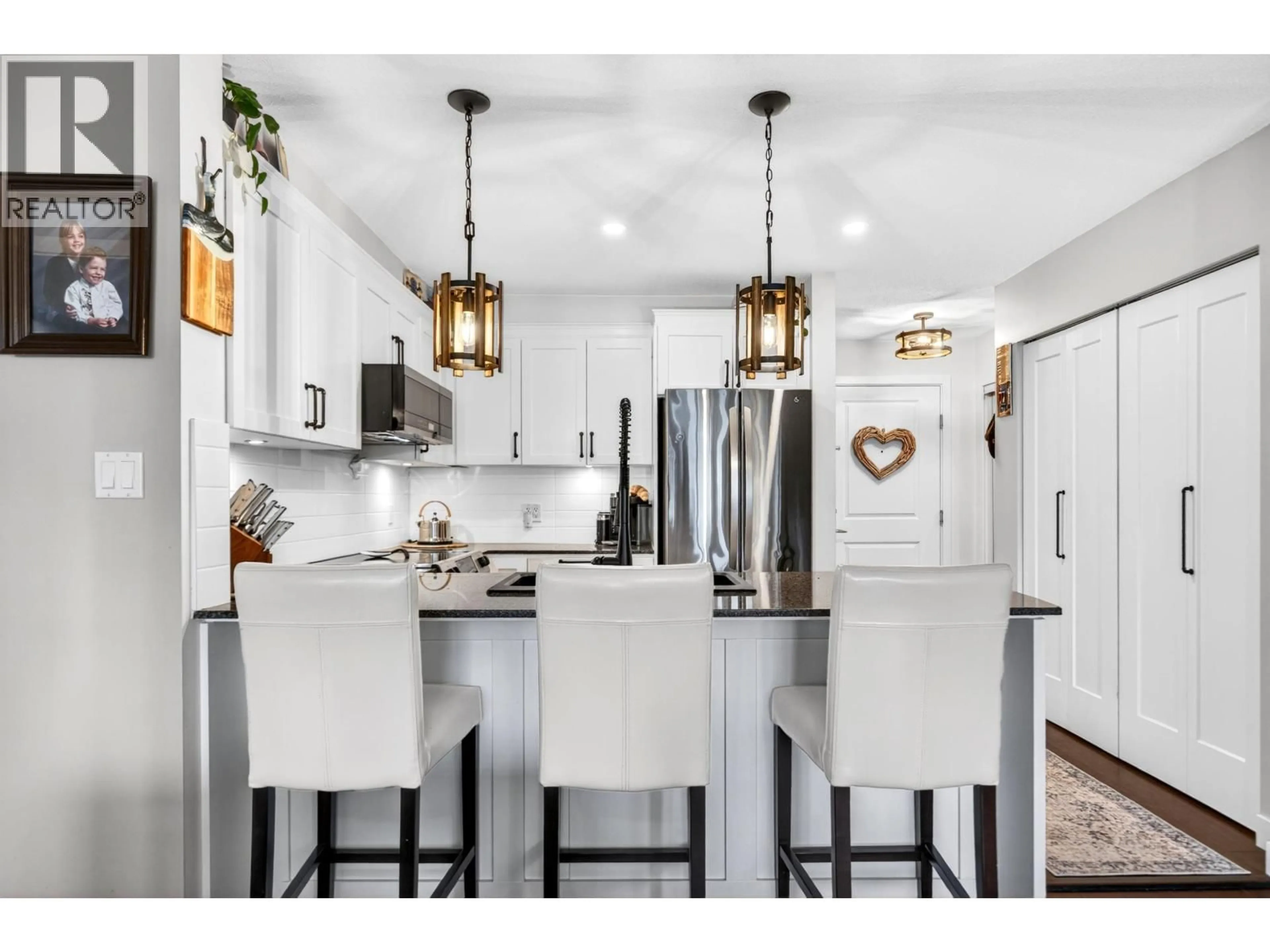 Open concept kitchen, unknown for 433 - 19673 MEADOW GARDENS WAY, Pitt Meadows British Columbia V3Y0A1