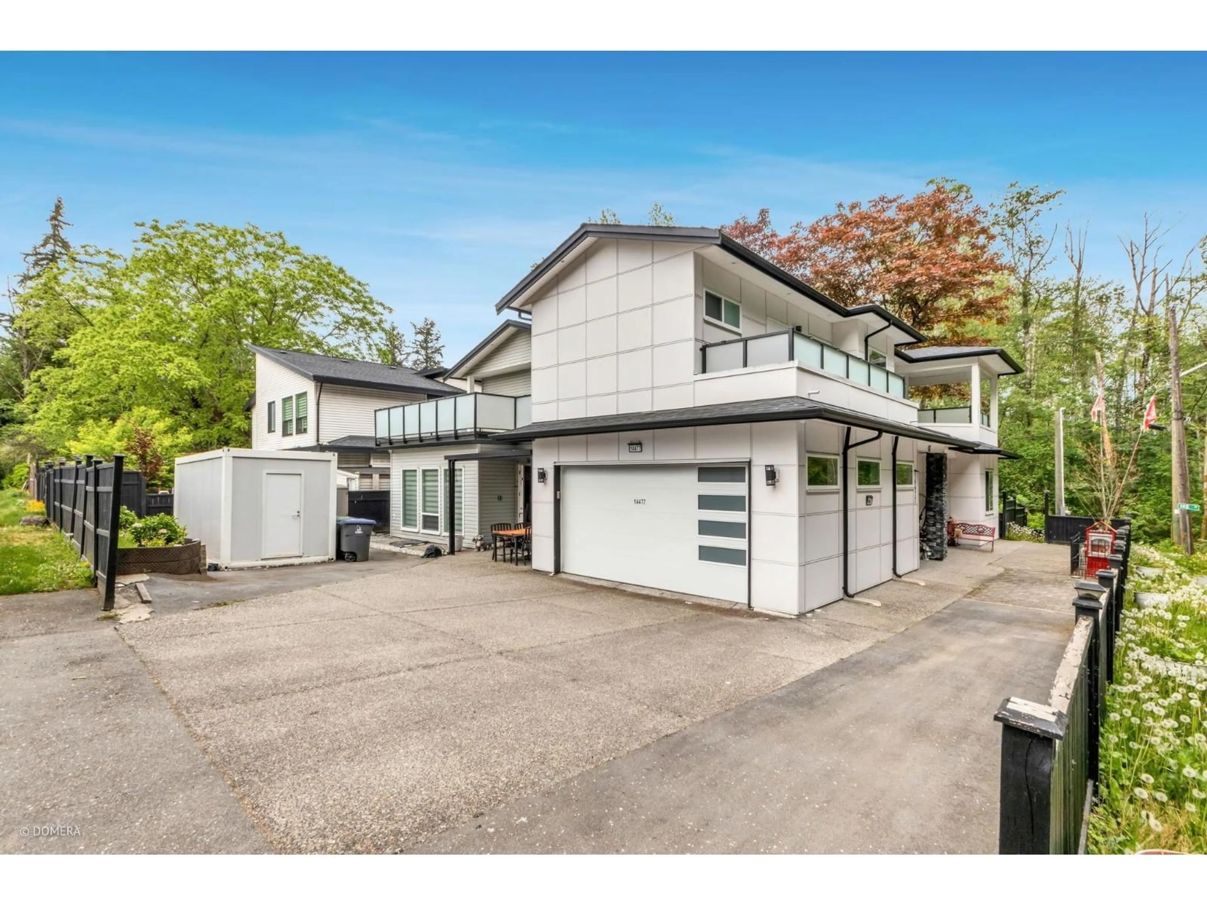 A pic from outside/outdoor area/front of a property/back of a property/a pic from drone, street for 14477 101 AVENUE, Surrey British Columbia V3R0B7