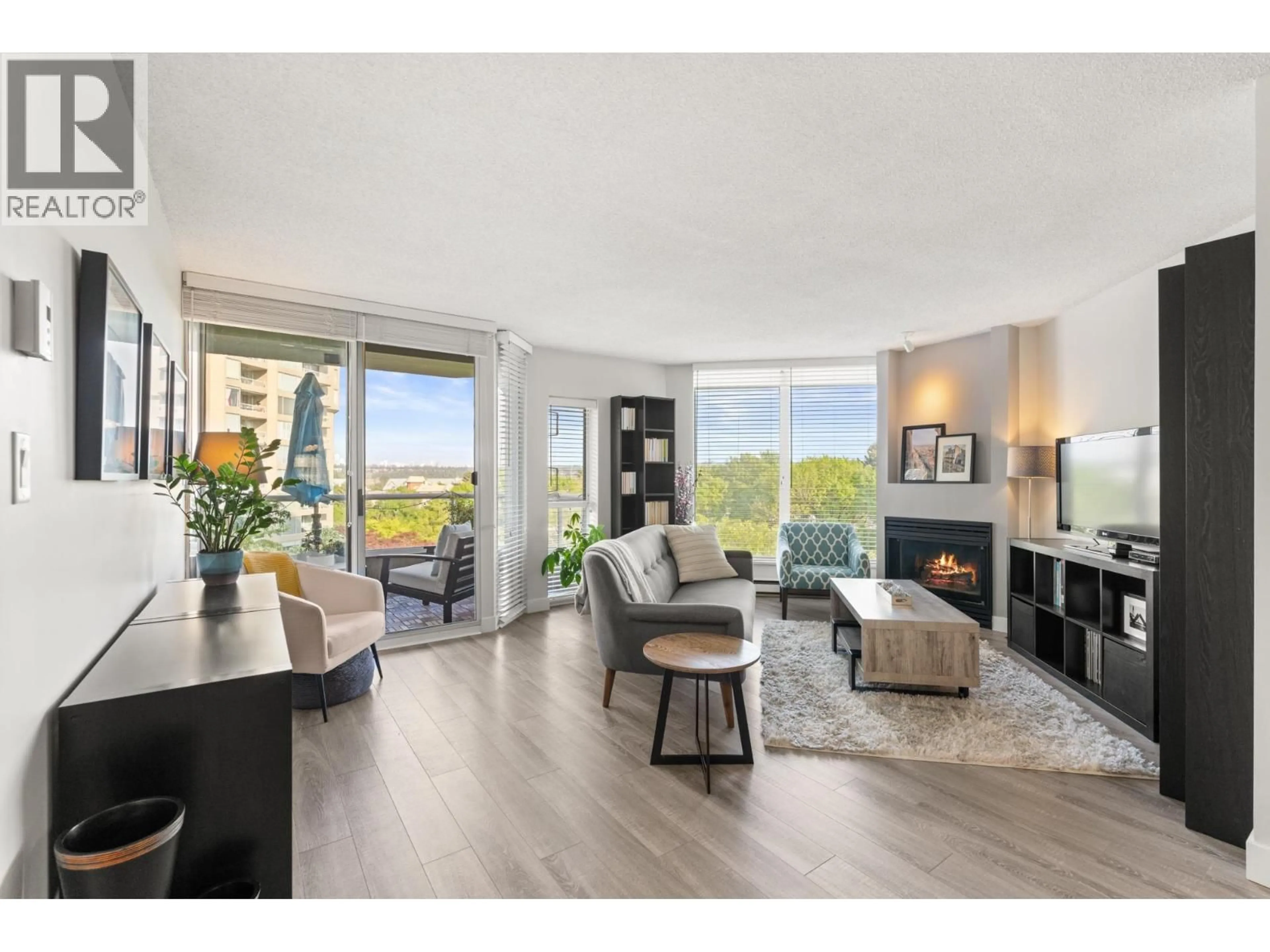 Living room with furniture, wood/laminate floor for 506 - 1135 QUAYSIDE DRIVE, New Westminster British Columbia V3M6J4