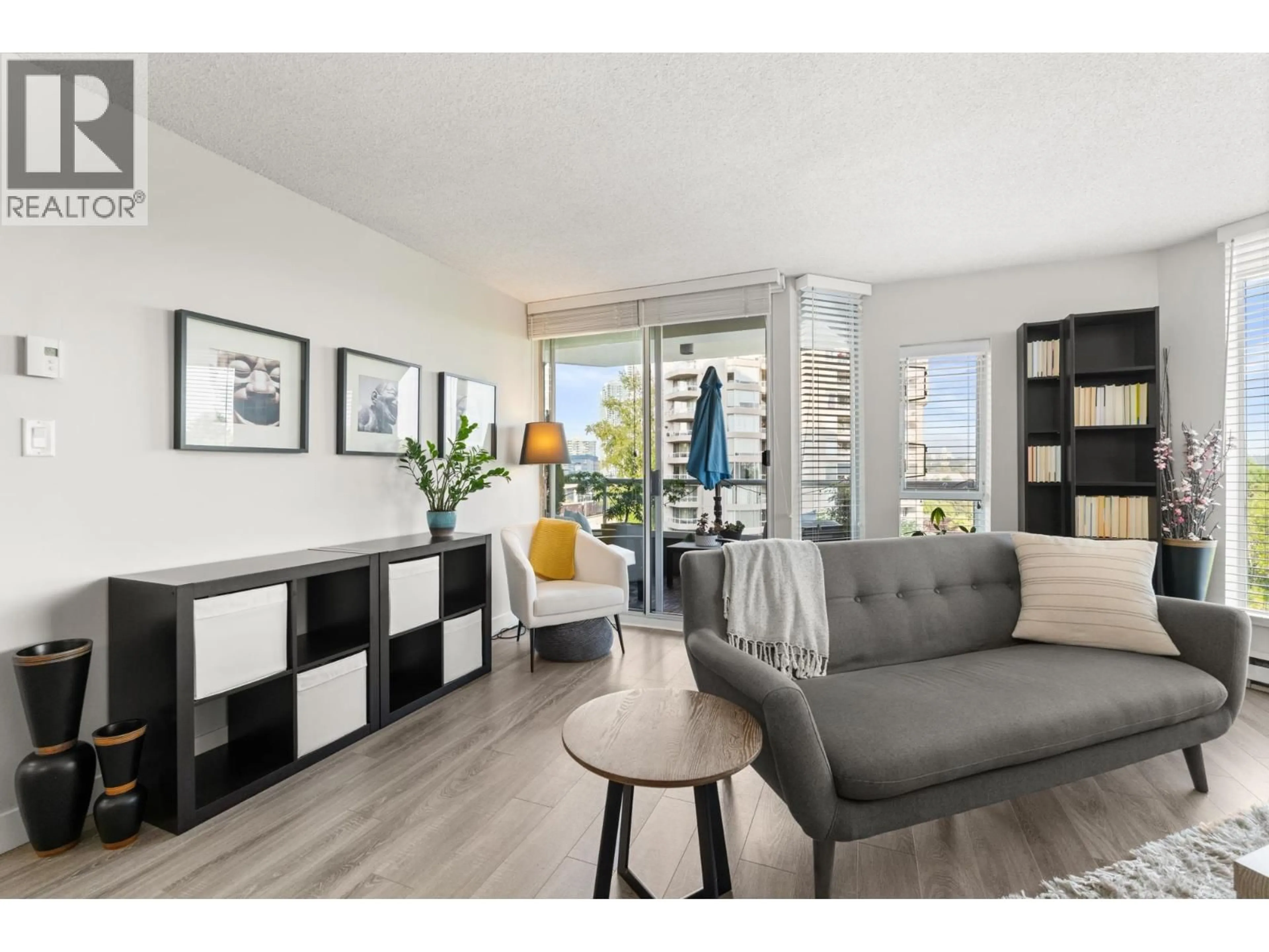 Living room with furniture, wood/laminate floor for 506 - 1135 QUAYSIDE DRIVE, New Westminster British Columbia V3M6J4