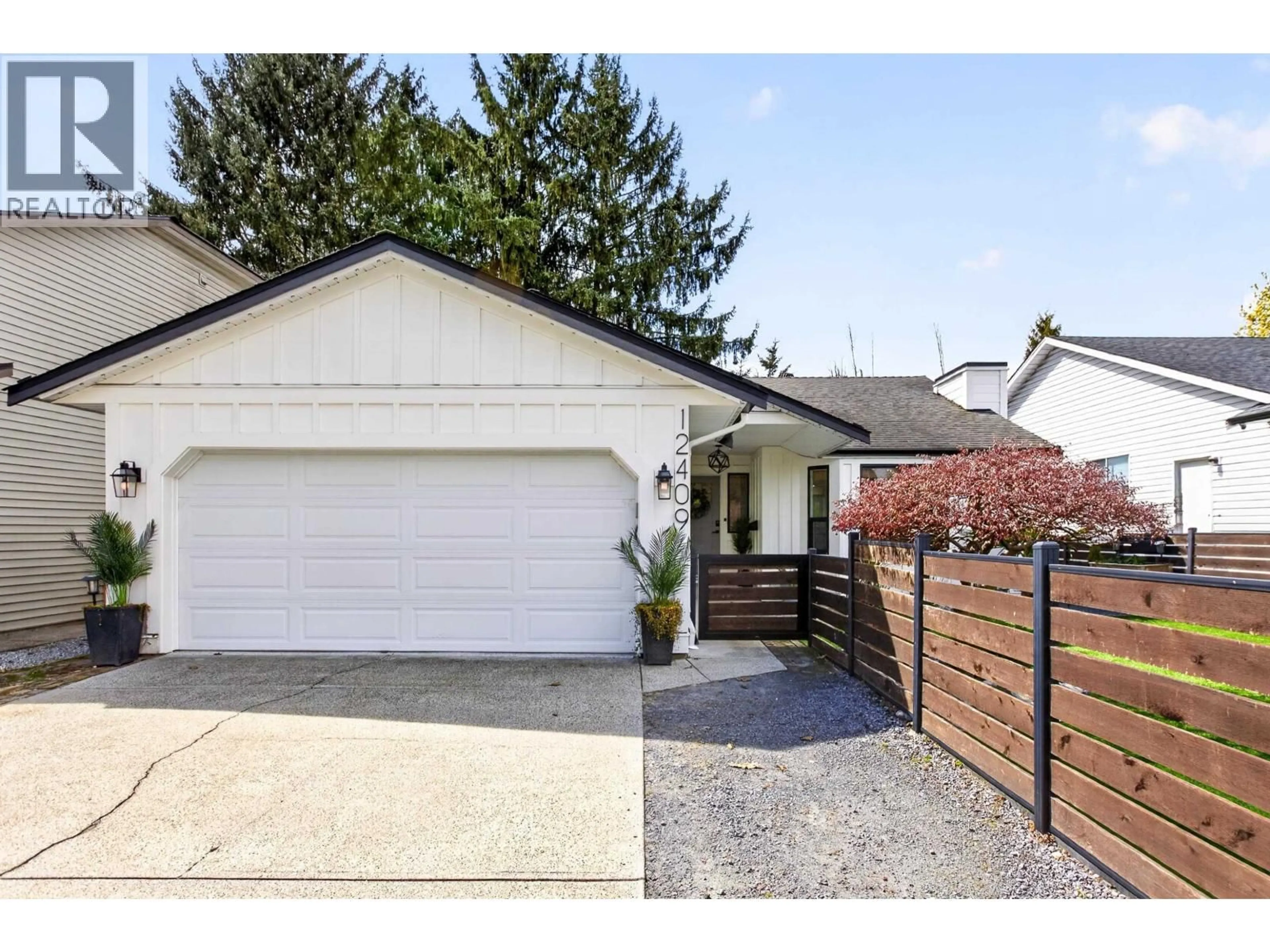 Home with vinyl exterior material, street for 12409 233A STREET, Maple Ridge British Columbia V2X0N1
