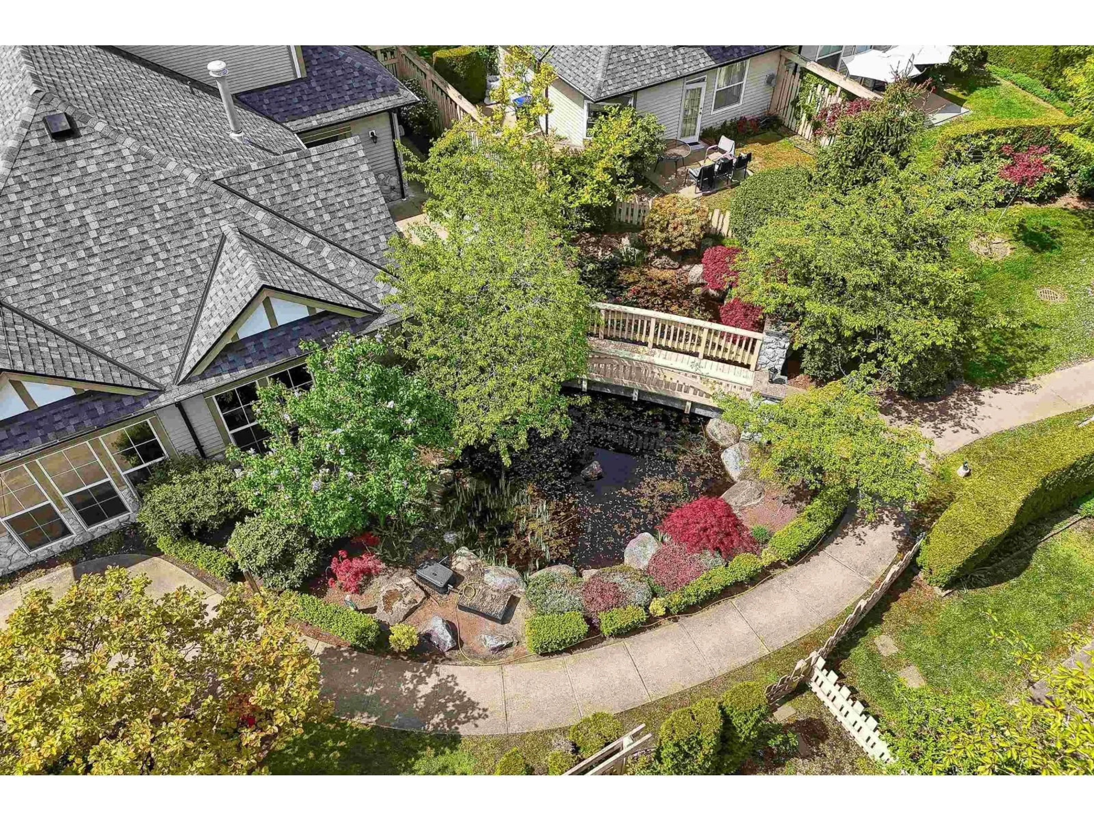 A pic from outside/outdoor area/front of a property/back of a property/a pic from drone, water/lake/river/ocean view for 45 - 18707 65 AVENUE, Surrey British Columbia V3S9H2