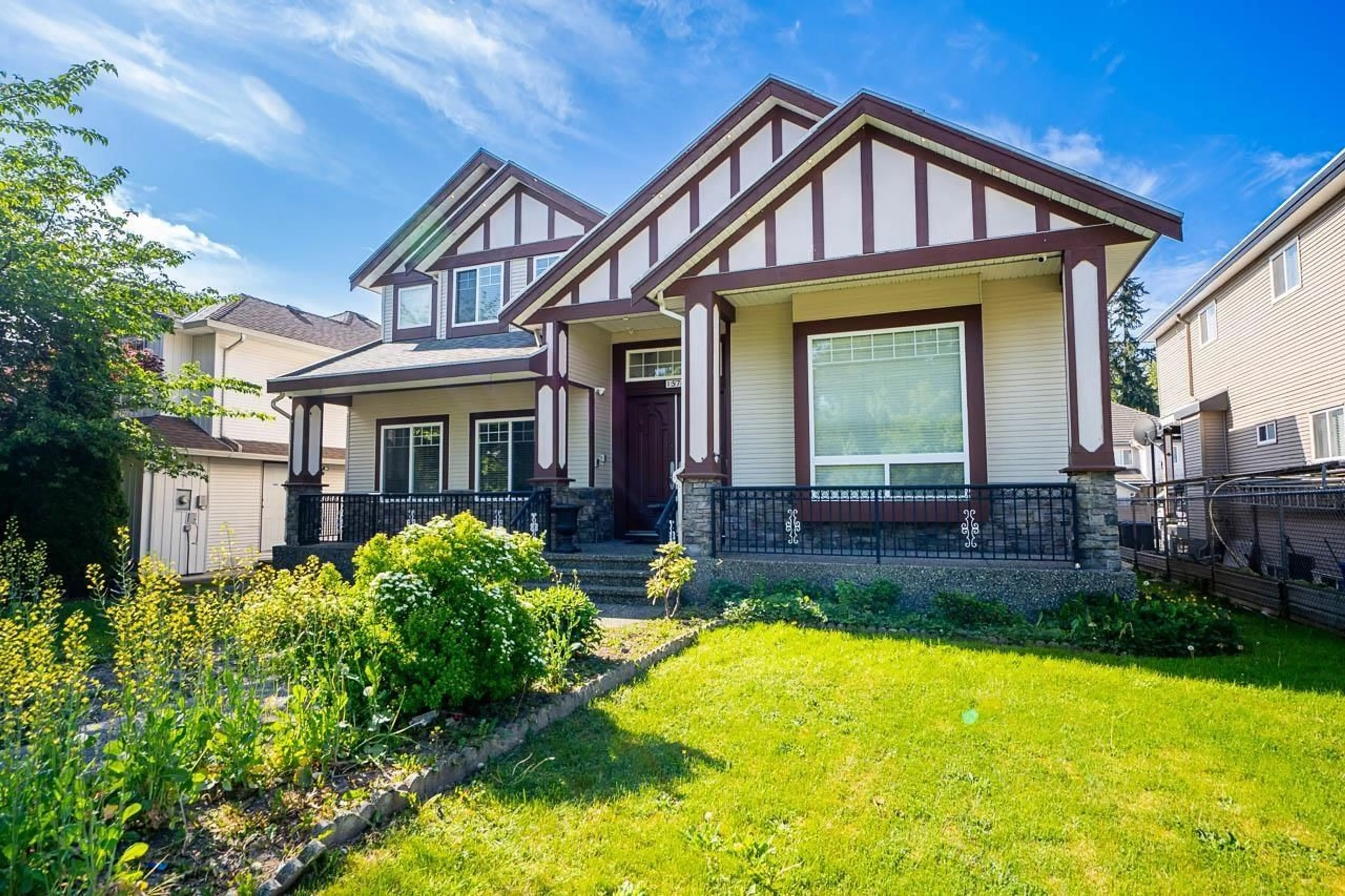 Home with vinyl exterior material, street for 15746 84 AVENUE, Surrey British Columbia V4N0W3