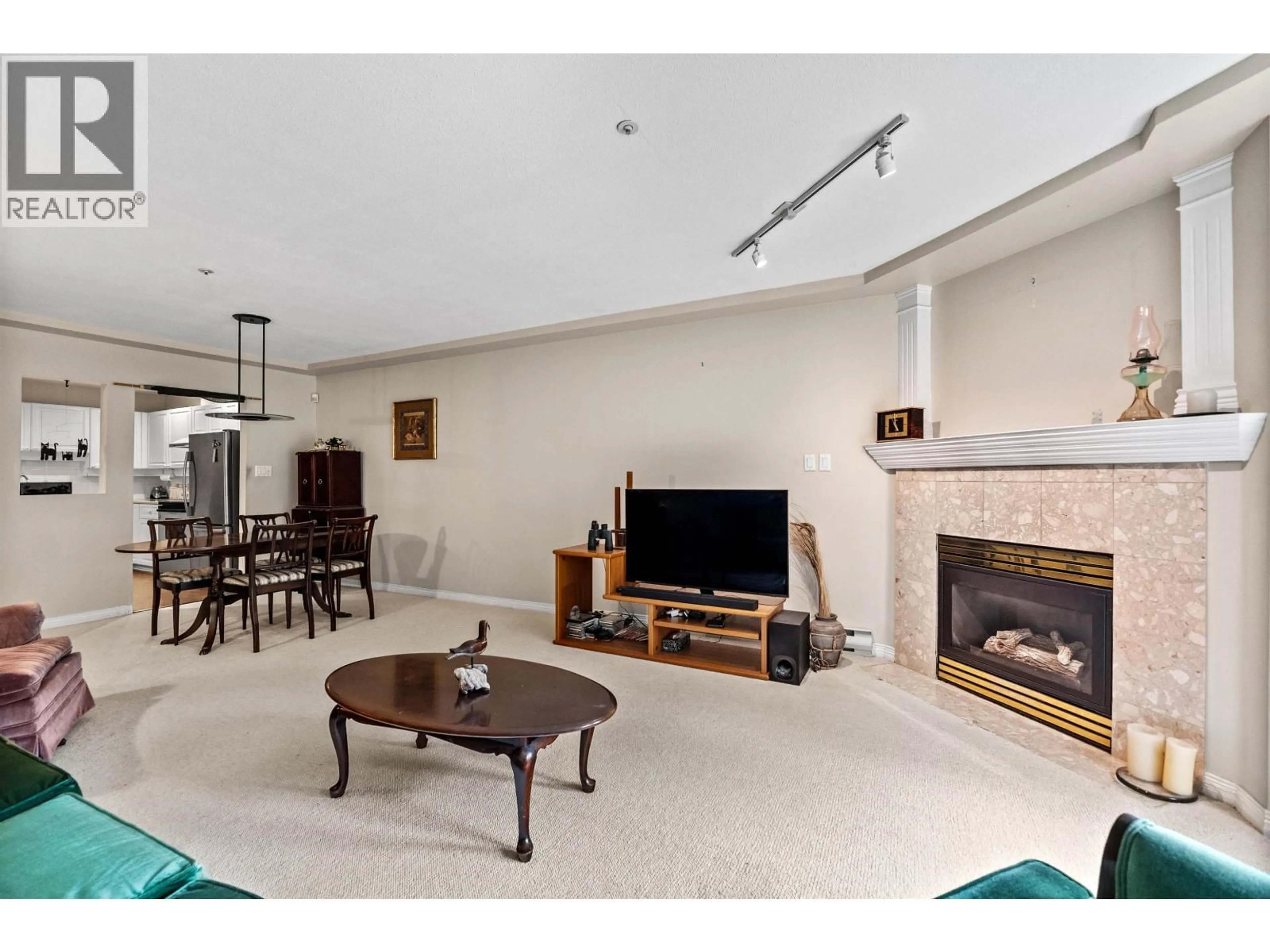 Living room with furniture, unknown for 206 - 1283 PARKGATE AVENUE, North Vancouver British Columbia V7H3A3