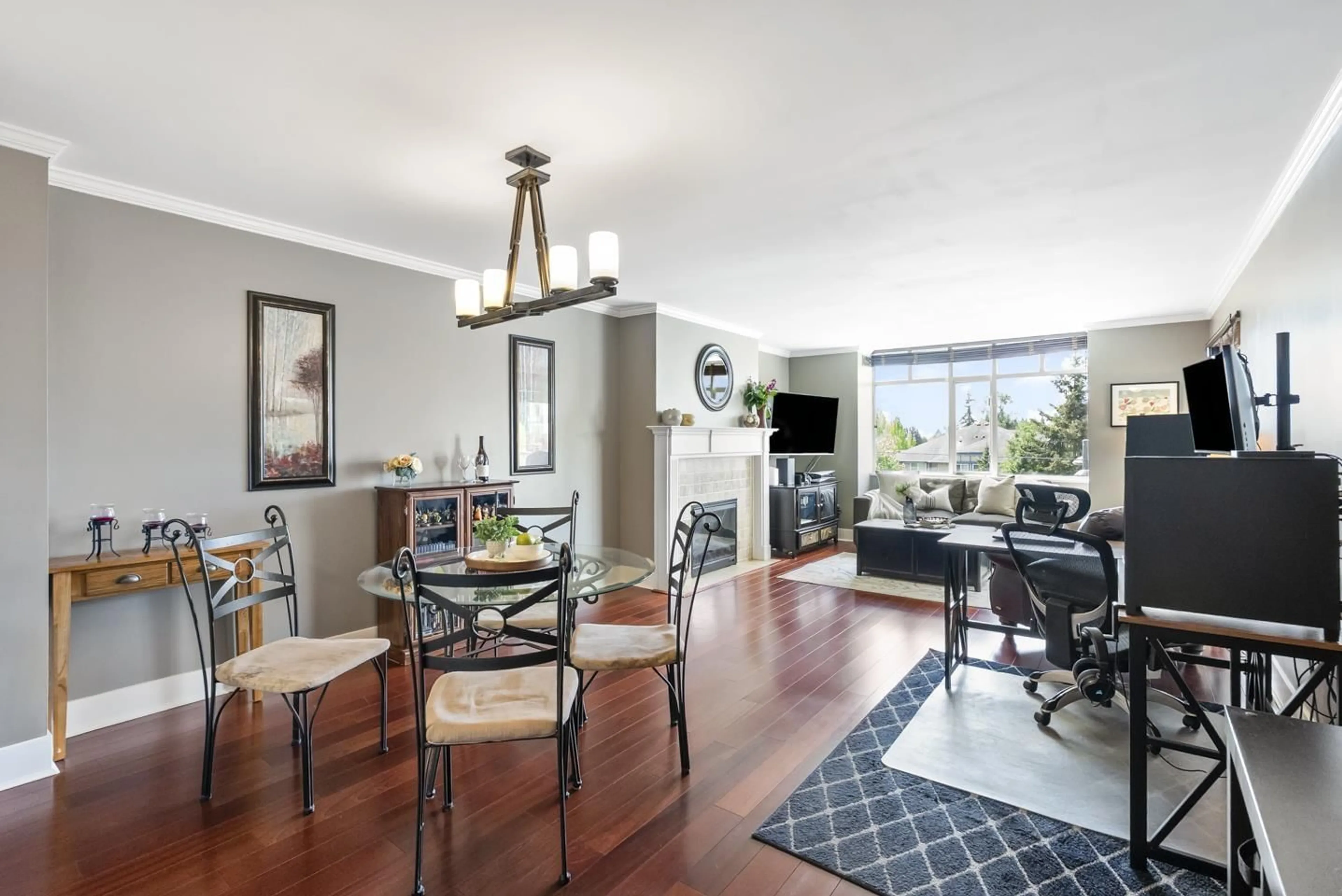 Living room with furniture, wood/laminate floor for 206 - 9763 140 STREET, Surrey British Columbia V3T4M4